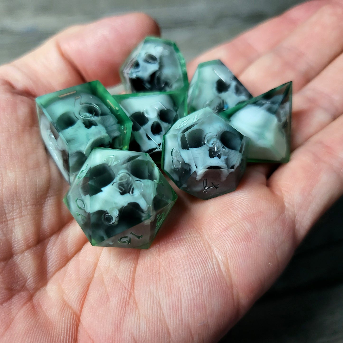 Dice set with 7 pieces with skull inside for role-playing games for Dungeons and Dragons