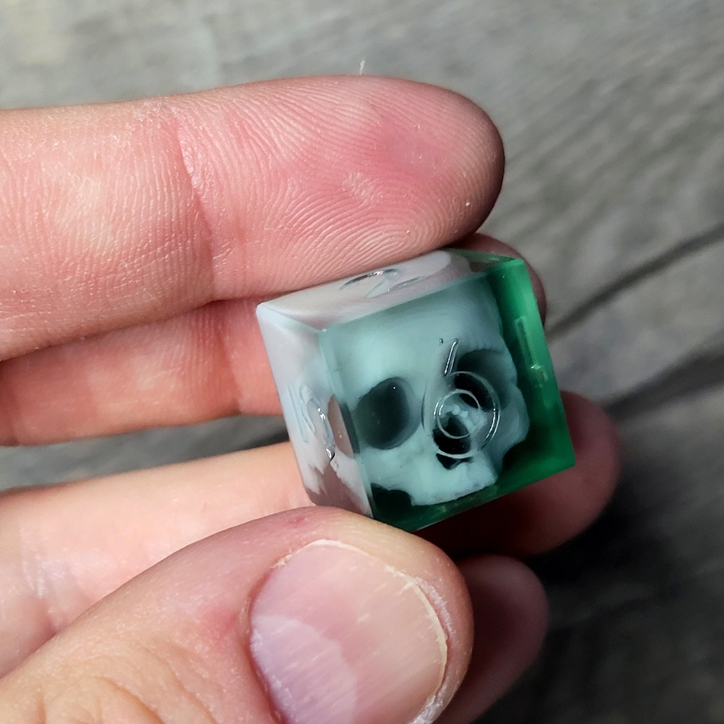 Dice set with 7 pieces with skull inside for role-playing games for Dungeons and Dragons