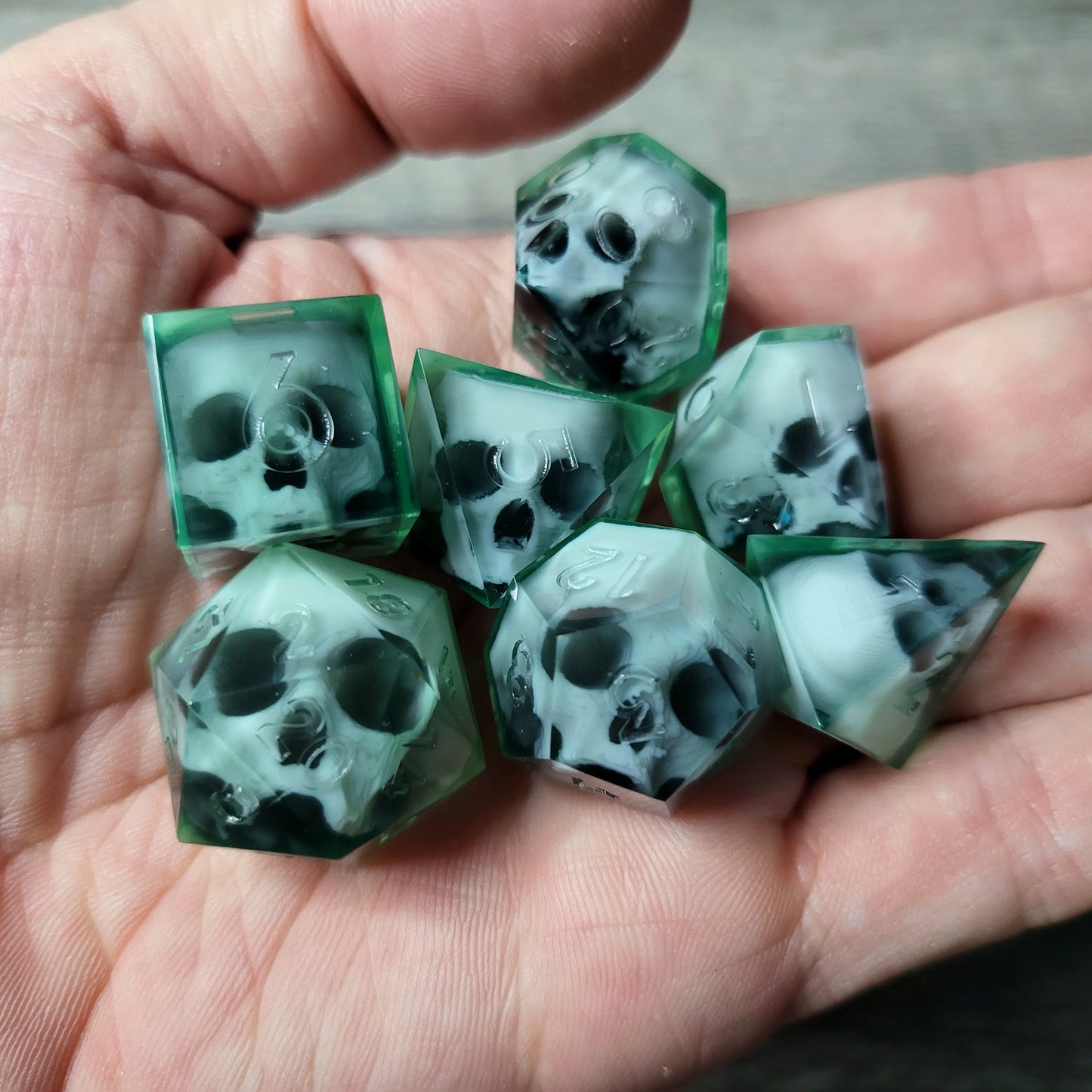 Dice set with 7 pieces with skull inside for role-playing games for Dungeons and Dragons