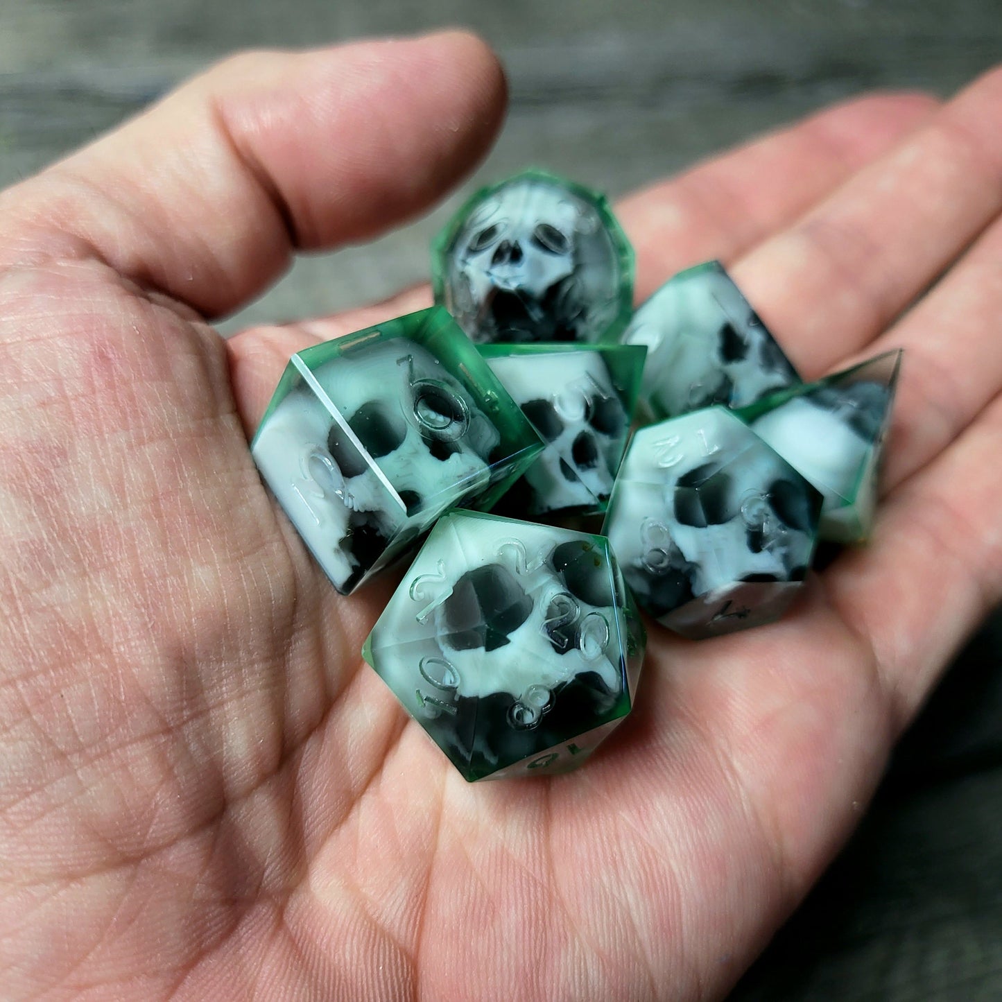 Dice set with 7 pieces with skull inside for role-playing games for Dungeons and Dragons