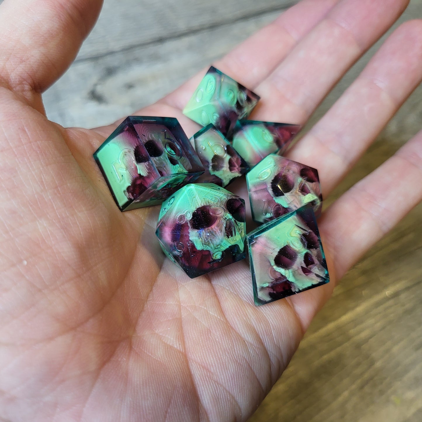 Dice set with 7 pieces with skull inside for role-playing games for Dungeons and Dragons