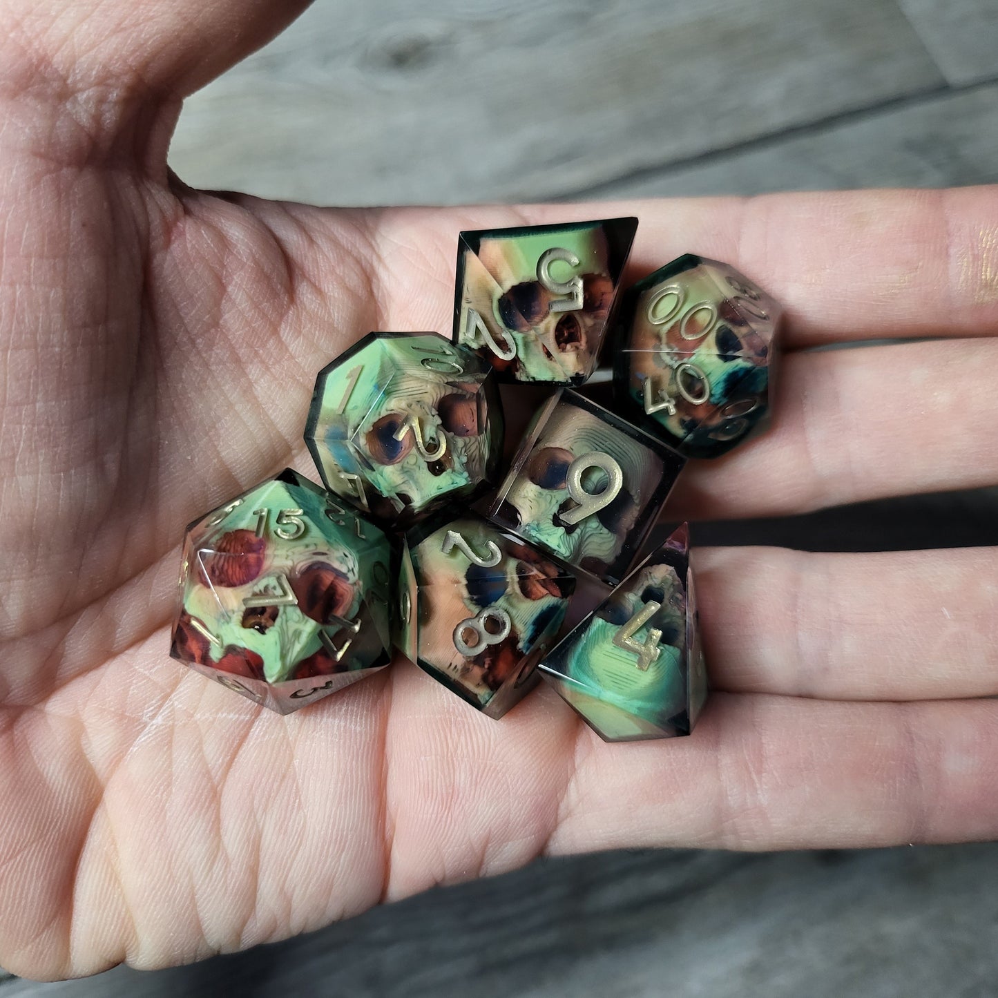 Dice set with 7 pieces with skull inside for role-playing games for Dungeons and Dragons