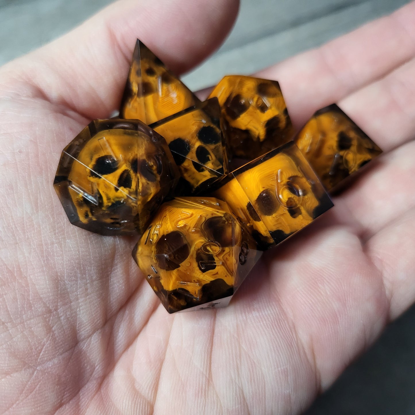 Dice set with 7 pieces with skull inside for role-playing games for Dungeons and Dragons