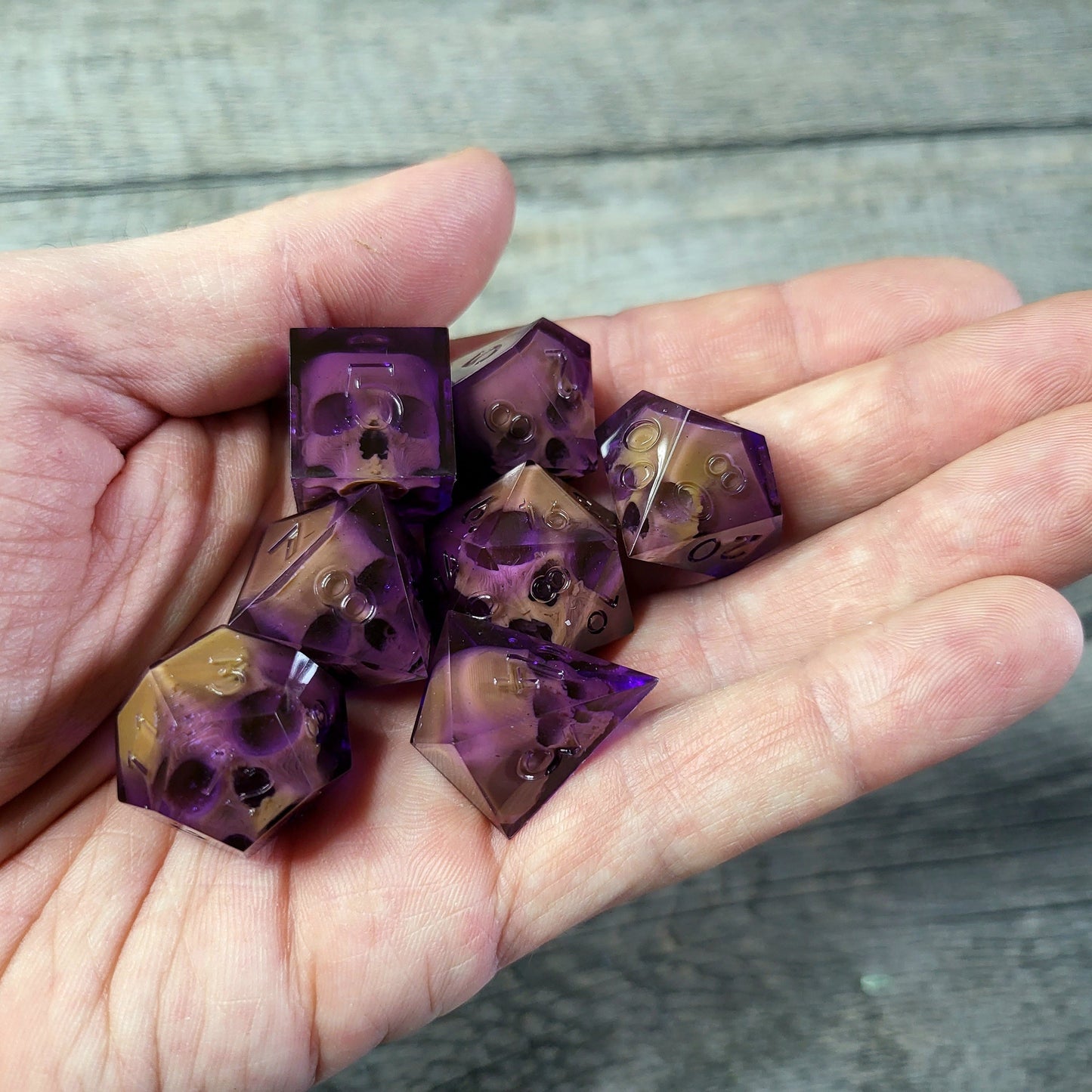 Dice set with 7 pieces with skull inside for role-playing games for Dungeons and Dragons