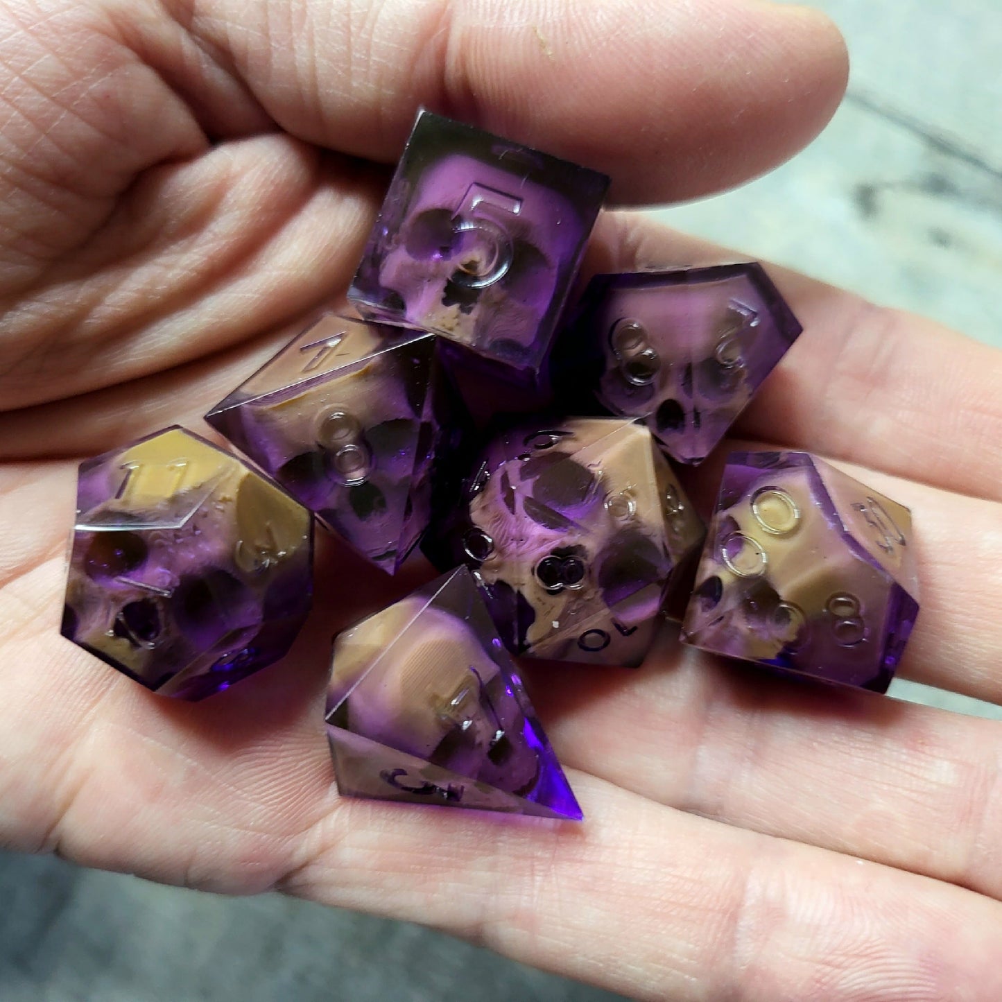 Dice set with 7 pieces with skull inside for role-playing games for Dungeons and Dragons