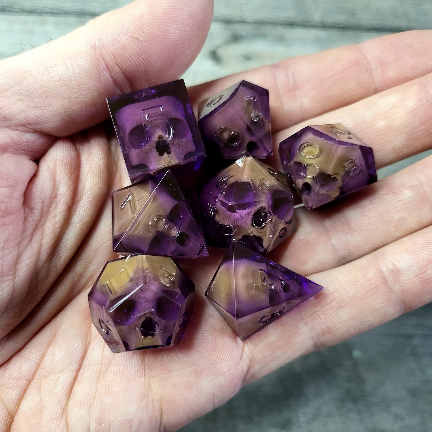 Dice set with 7 pieces with skull inside for role-playing games for Dungeons and Dragons
