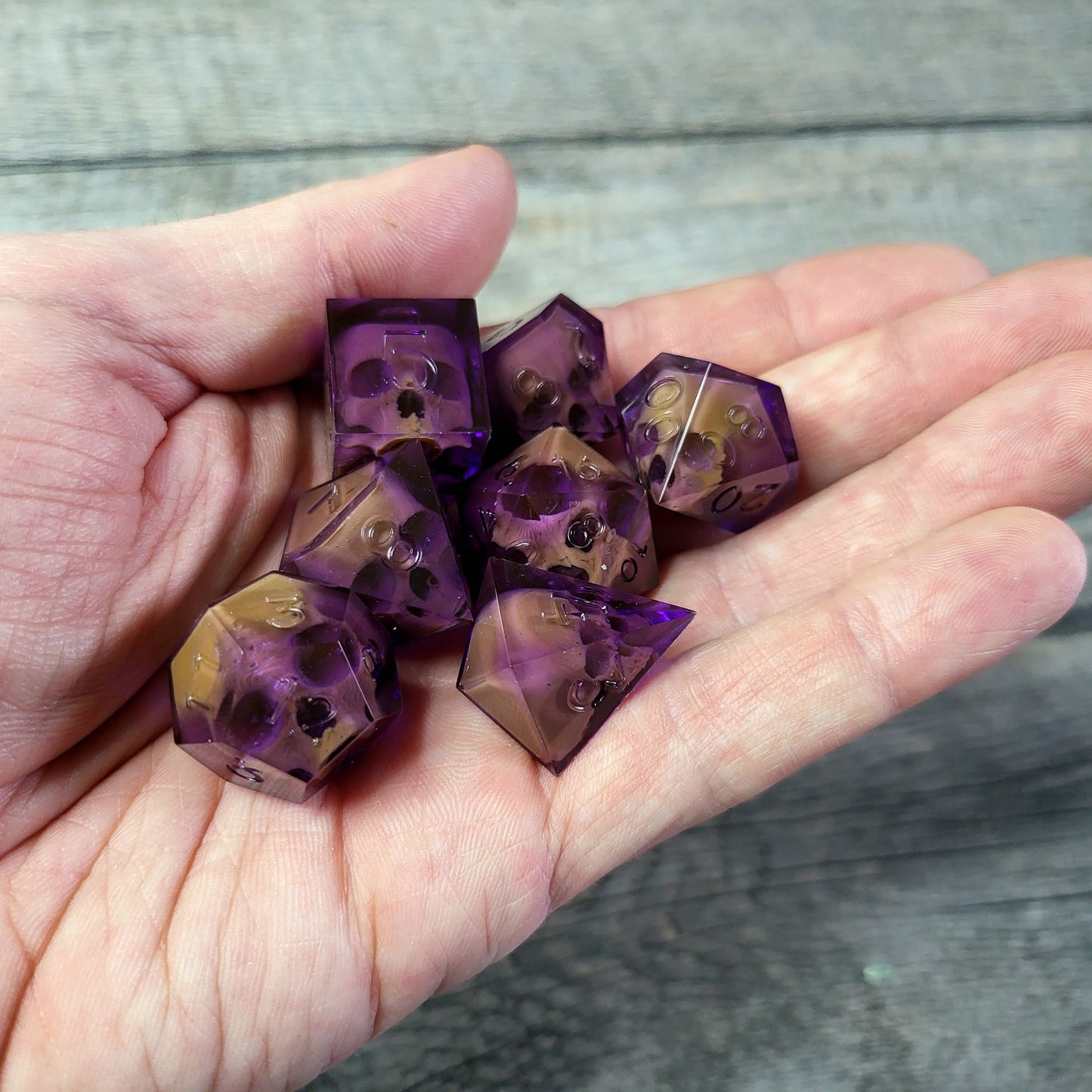 Dice set with 7 pieces with skull inside for role-playing games for Dungeons and Dragons