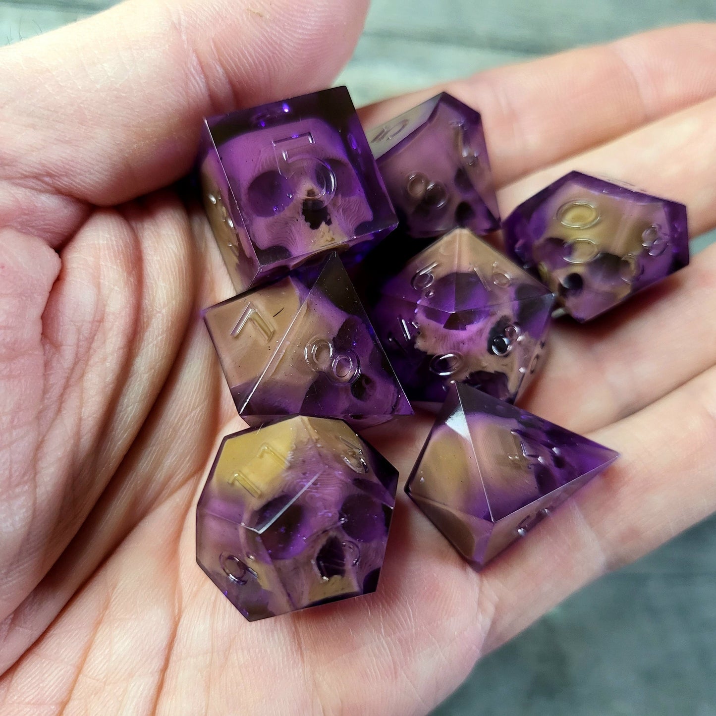 Dice set with 7 pieces with skull inside for role-playing games for Dungeons and Dragons