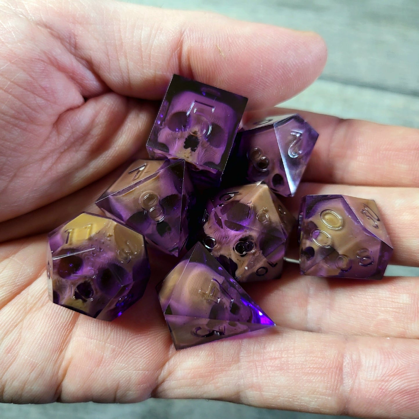 Dice set with 7 pieces with skull inside for role-playing games for Dungeons and Dragons