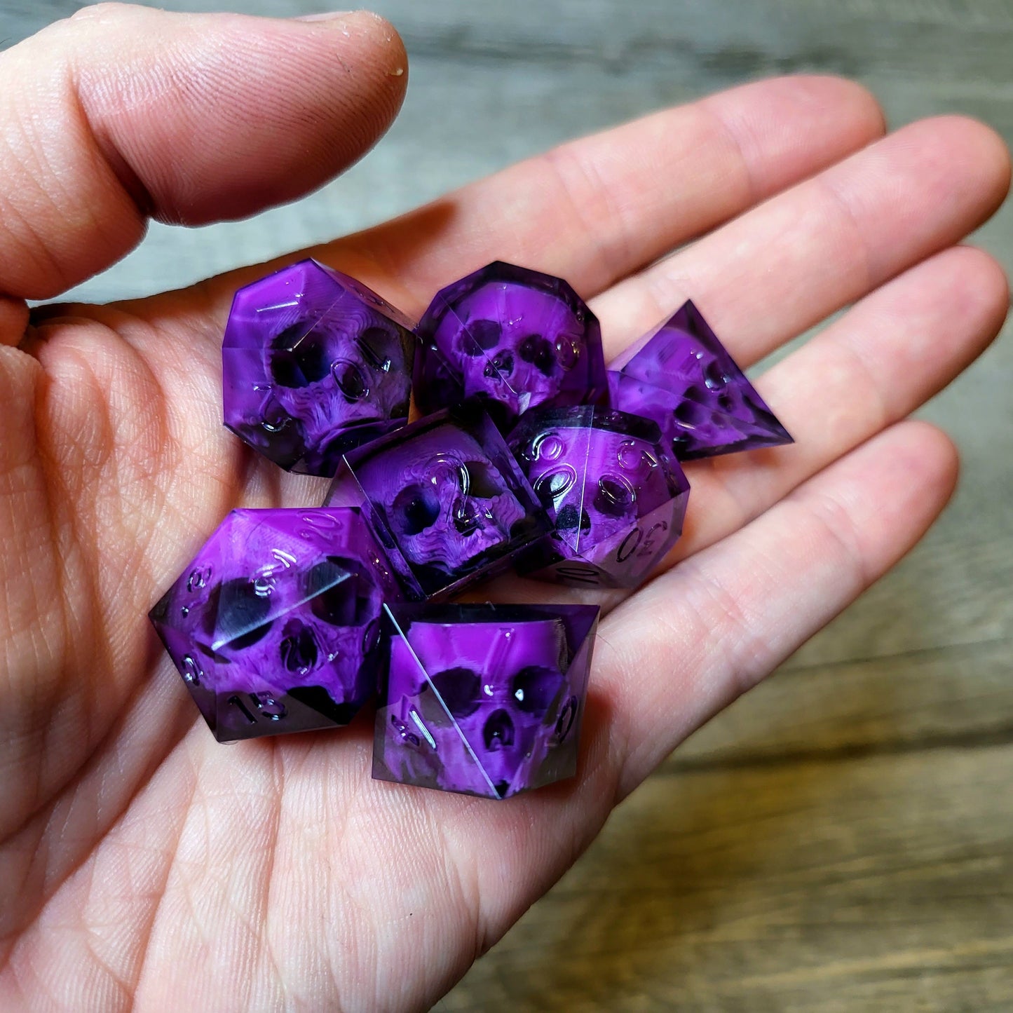 Dice set with 7 pieces with skull inside for role-playing games for Dungeons and Dragons