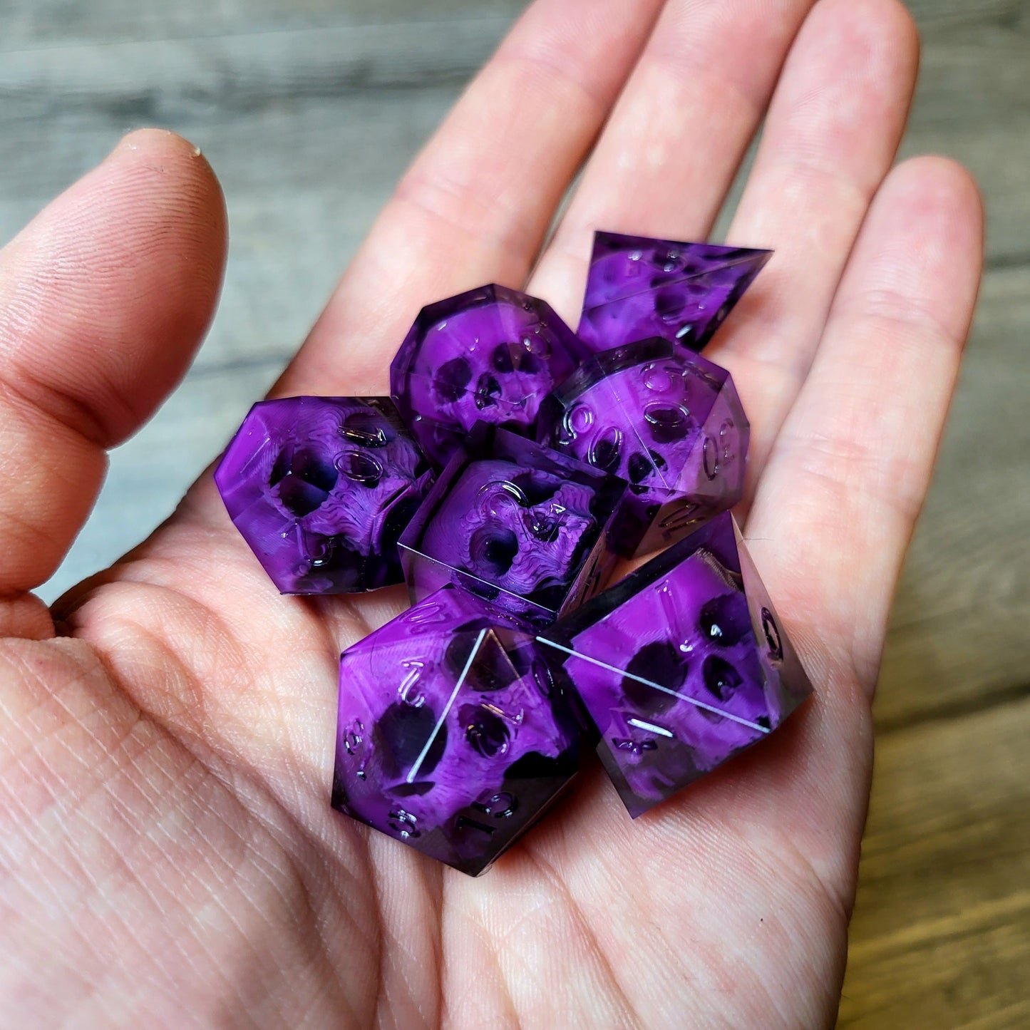 Dice set with 7 pieces with skull inside for role-playing games for Dungeons and Dragons