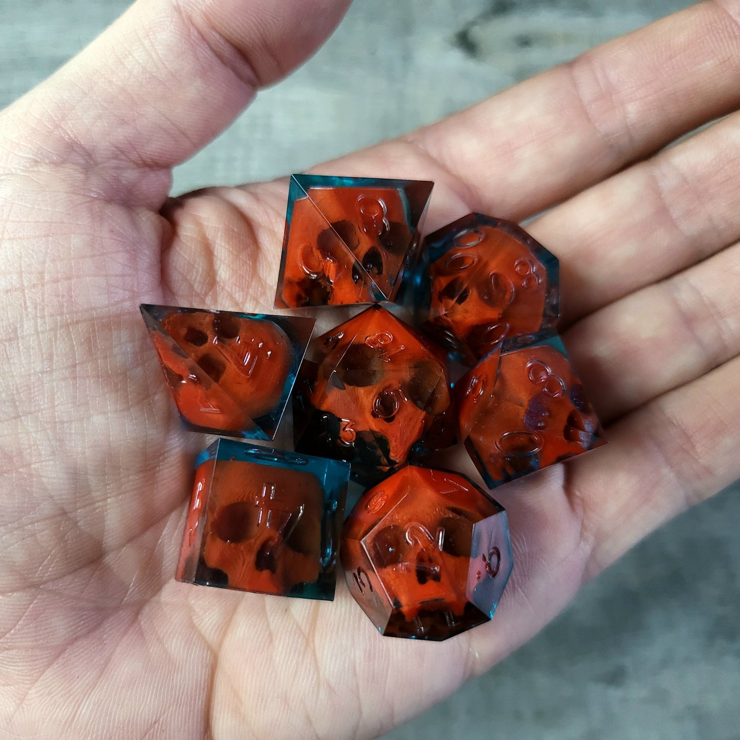 Dice set with 7 pieces with skull inside for role-playing games for Dungeons and Dragons