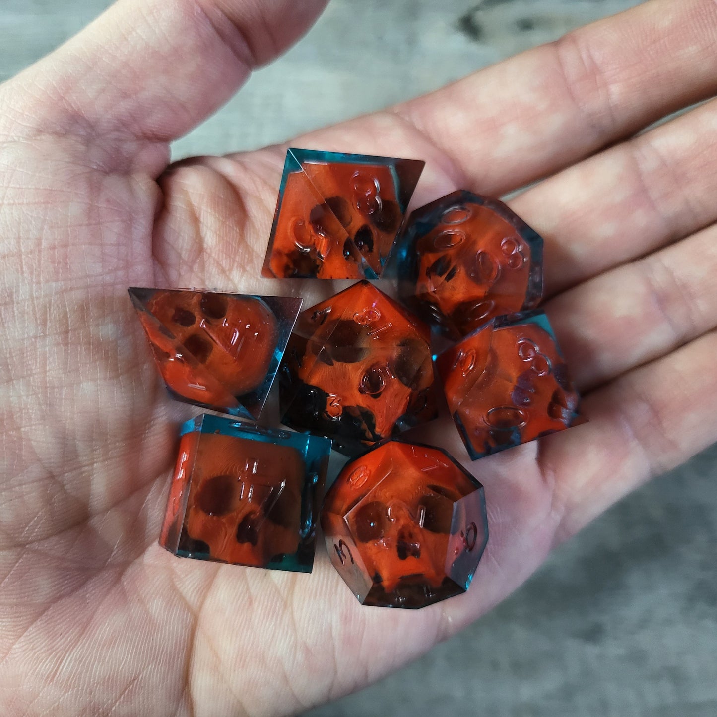 Dice set with 7 pieces with skull inside for role-playing games for Dungeons and Dragons