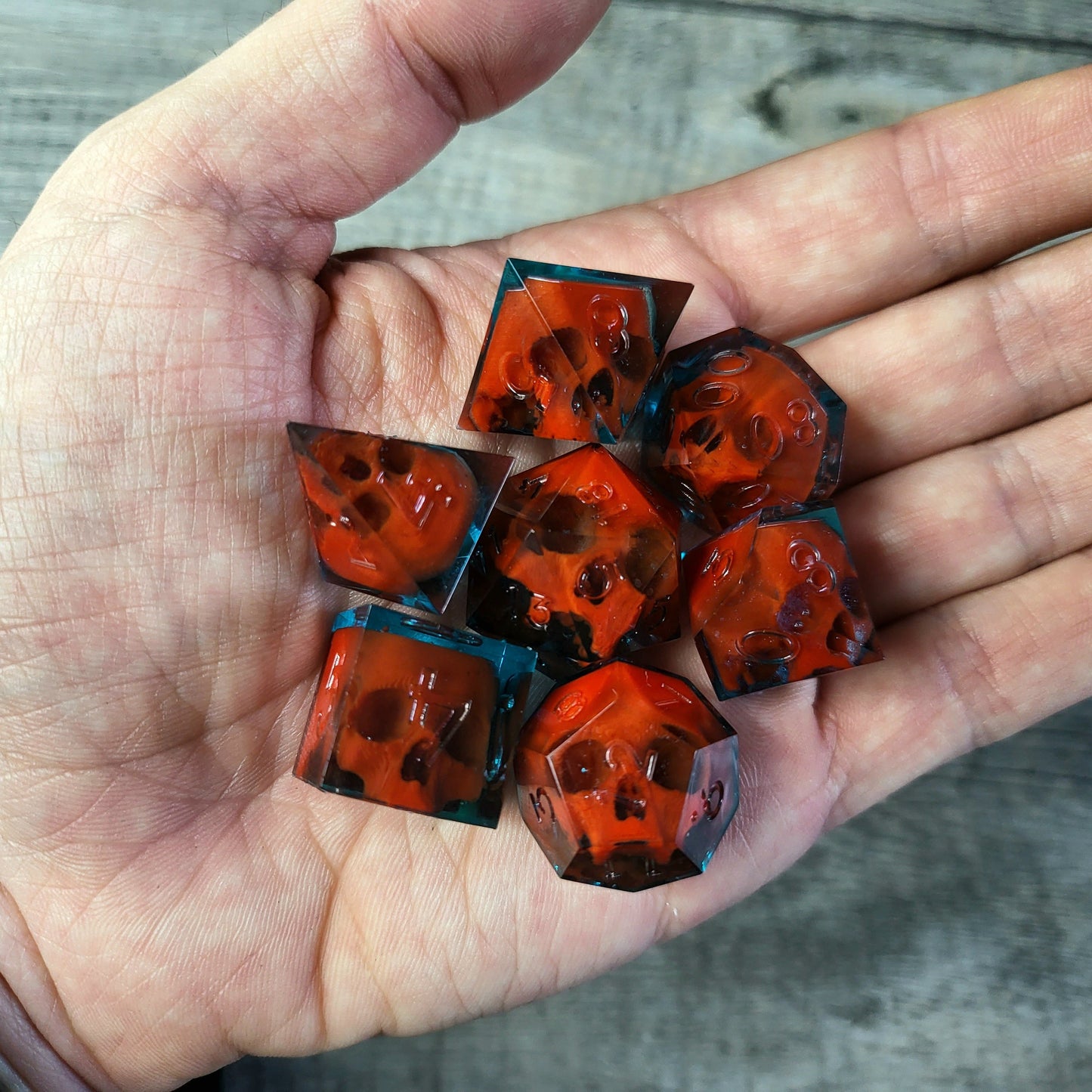 Dice set with 7 pieces with skull inside for role-playing games for Dungeons and Dragons