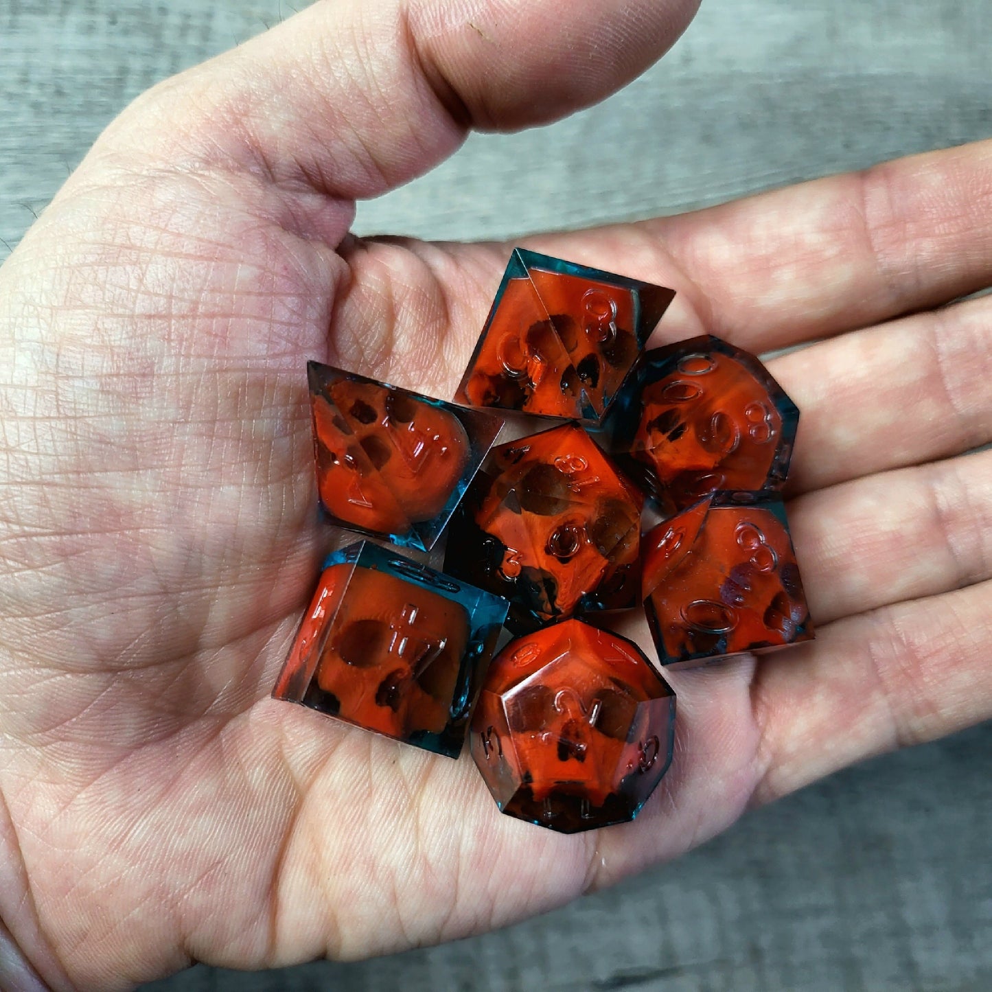 Dice set with 7 pieces with skull inside for role-playing games for Dungeons and Dragons