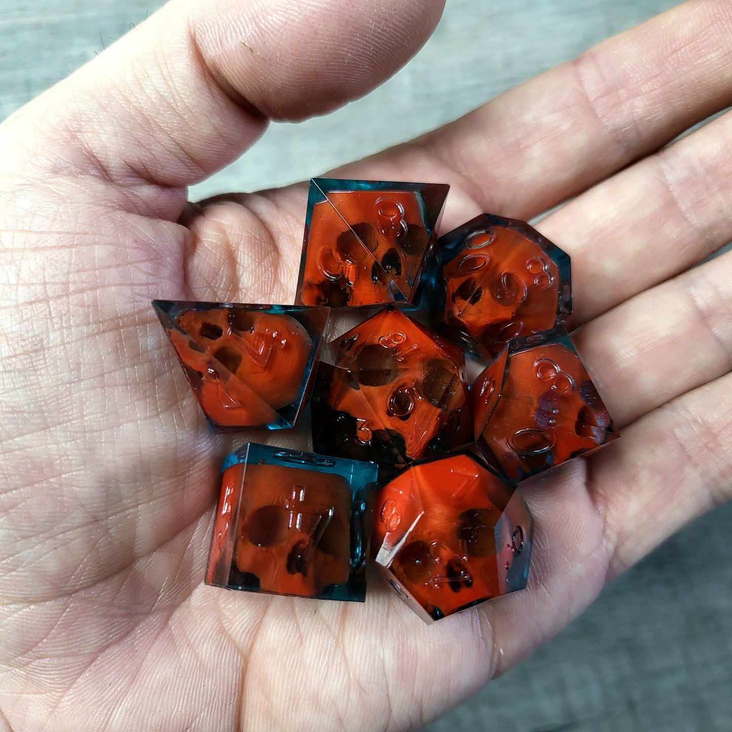Dice set with 7 pieces with skull inside for role-playing games for Dungeons and Dragons