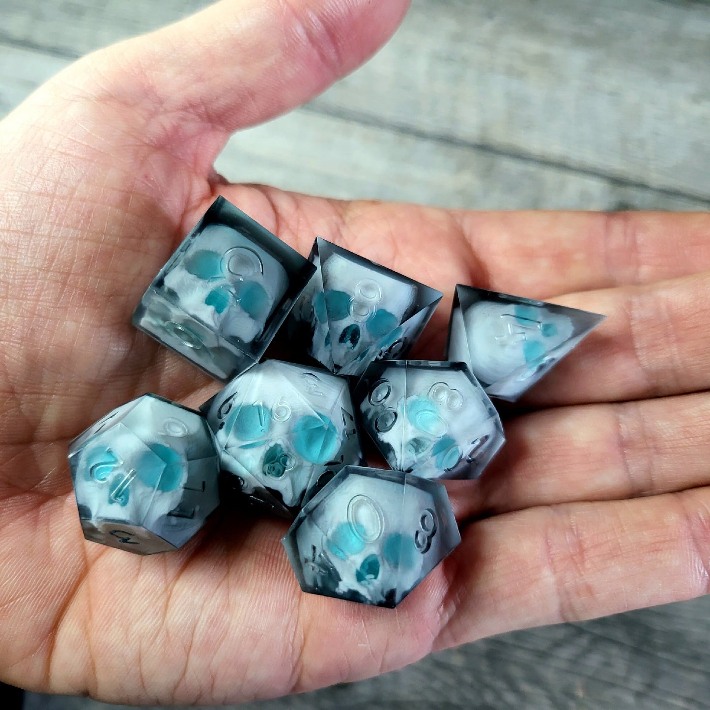 Dice set with 7 pieces with skull inside for role-playing games for Dungeons and Dragons