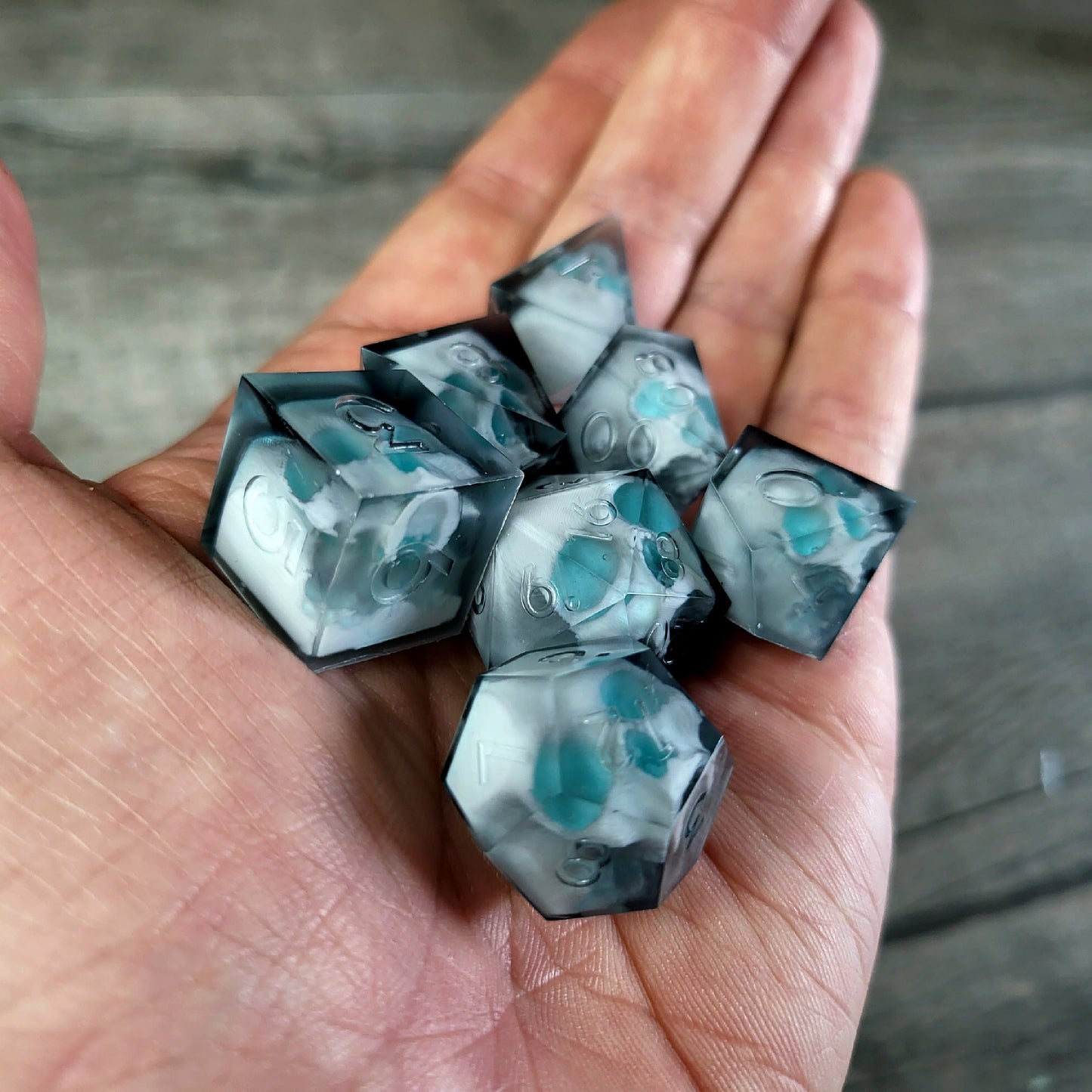 Dice set with 7 pieces with skull inside for role-playing games for Dungeons and Dragons