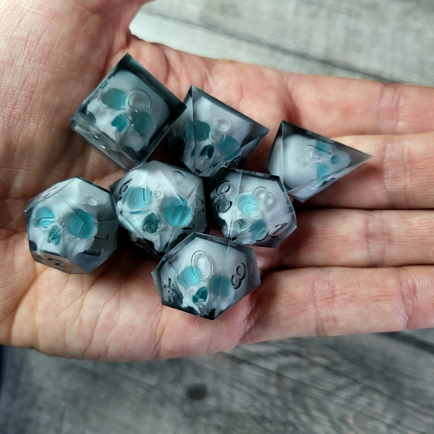 Dice set with 7 pieces with skull inside for role-playing games for Dungeons and Dragons