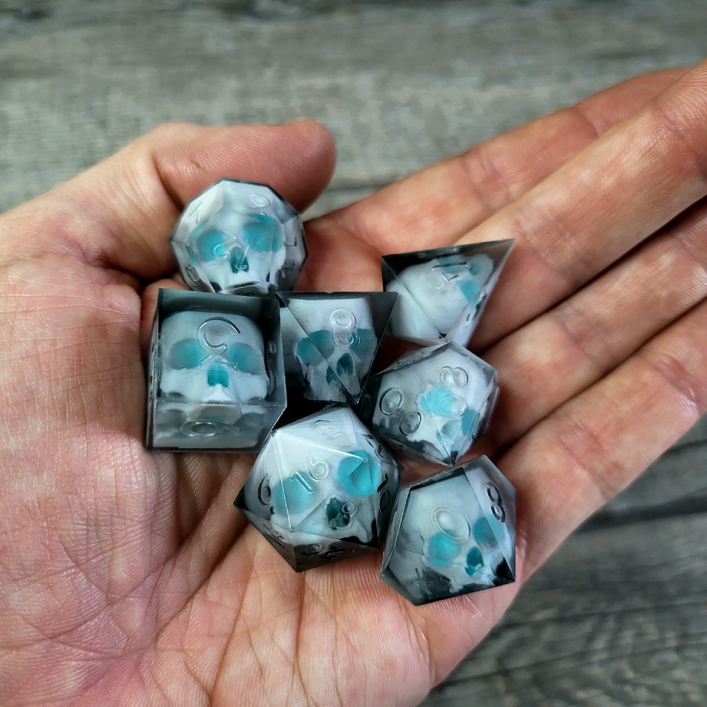 Dice set with 7 pieces with skull inside for role-playing games for Dungeons and Dragons