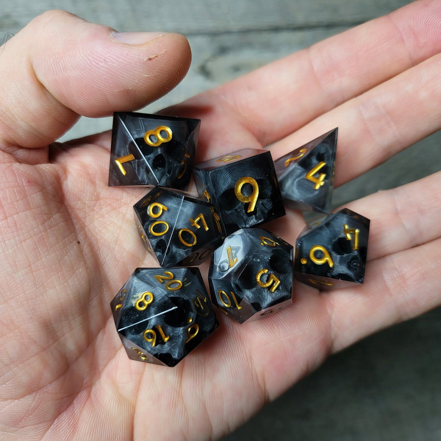 Dice set with 7 pieces with skull inside for role-playing games for Dungeons and Dragons