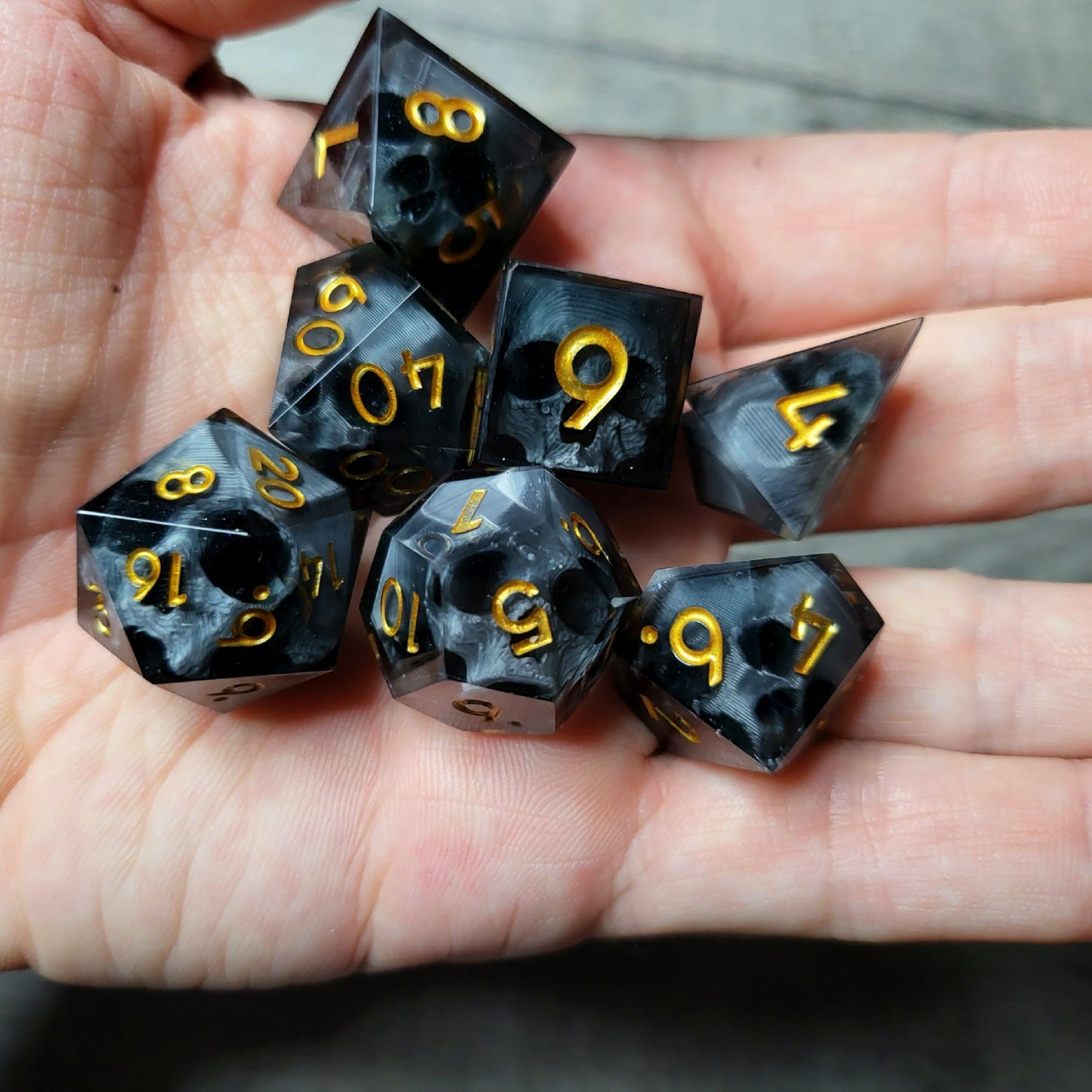 Dice set with 7 pieces with skull inside for role-playing games for Dungeons and Dragons