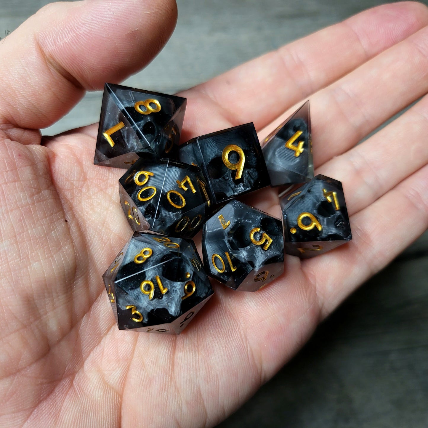 Dice set with 7 pieces with skull inside for role-playing games for Dungeons and Dragons