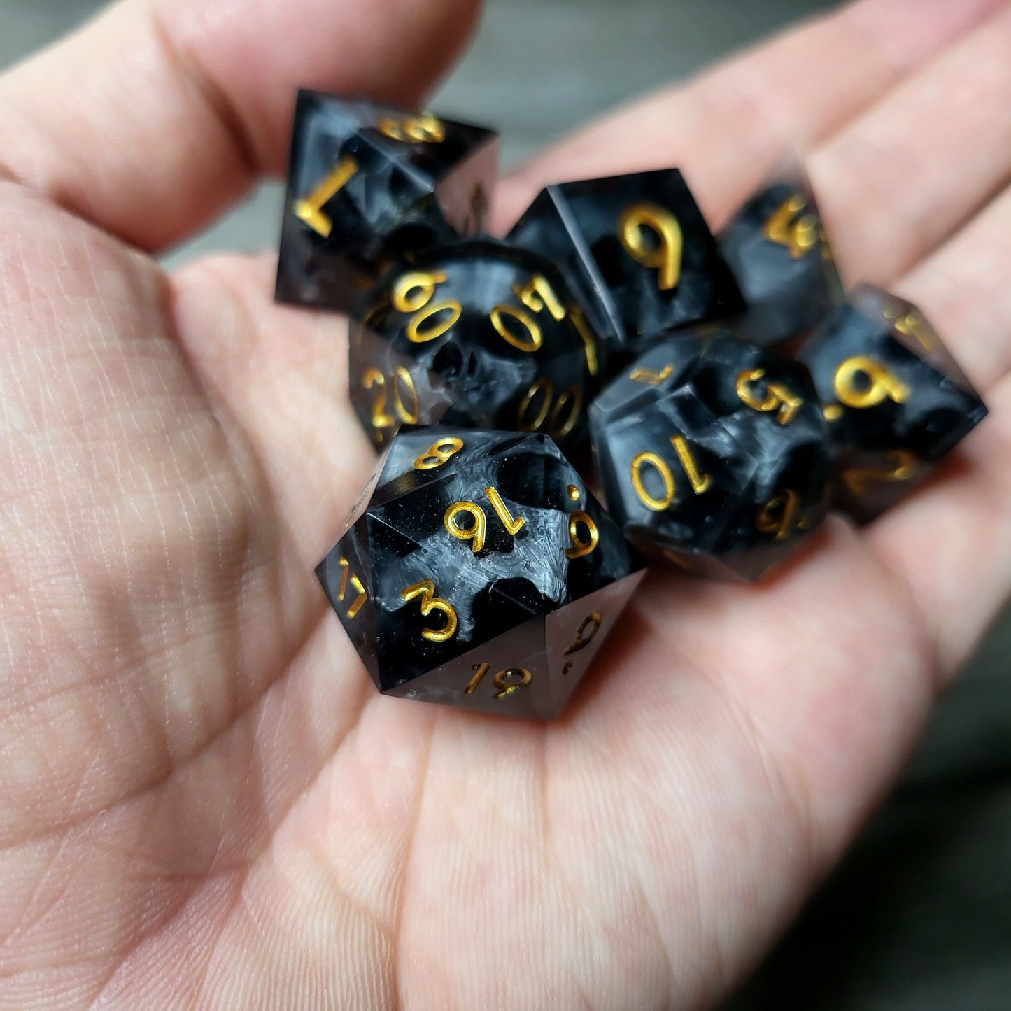 Dice set with 7 pieces with skull inside for role-playing games for Dungeons and Dragons