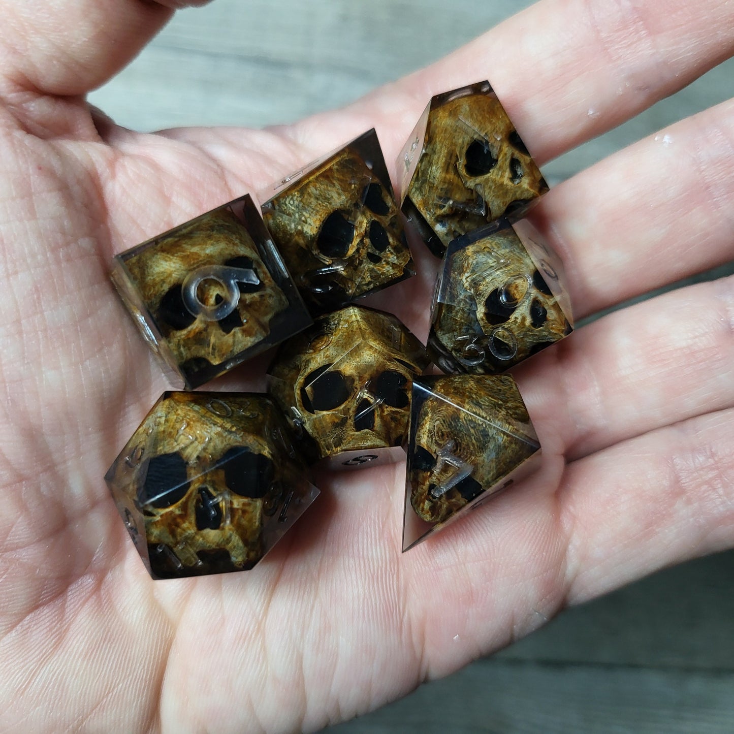 Dice set with 7 pieces with skull inside for role-playing games for Dungeons and Dragons