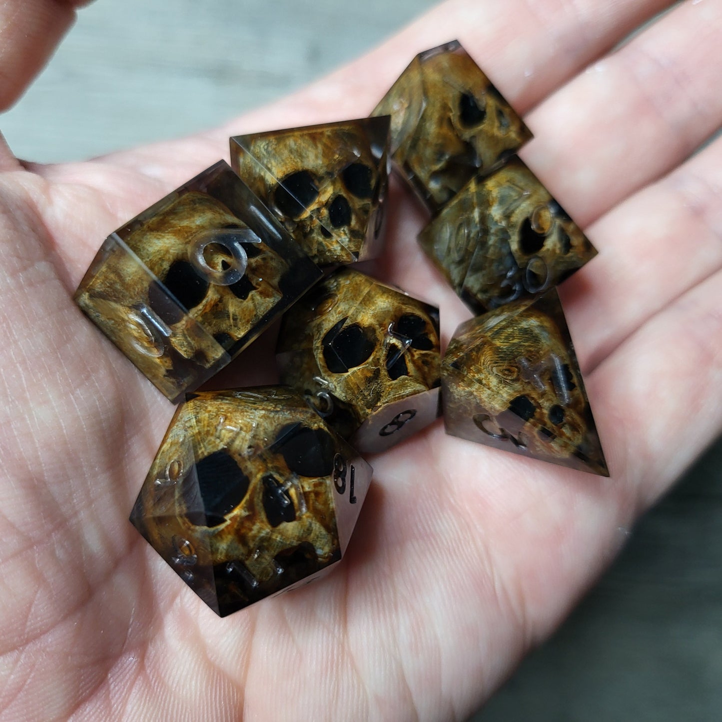 Dice set with 7 pieces with skull inside for role-playing games for Dungeons and Dragons