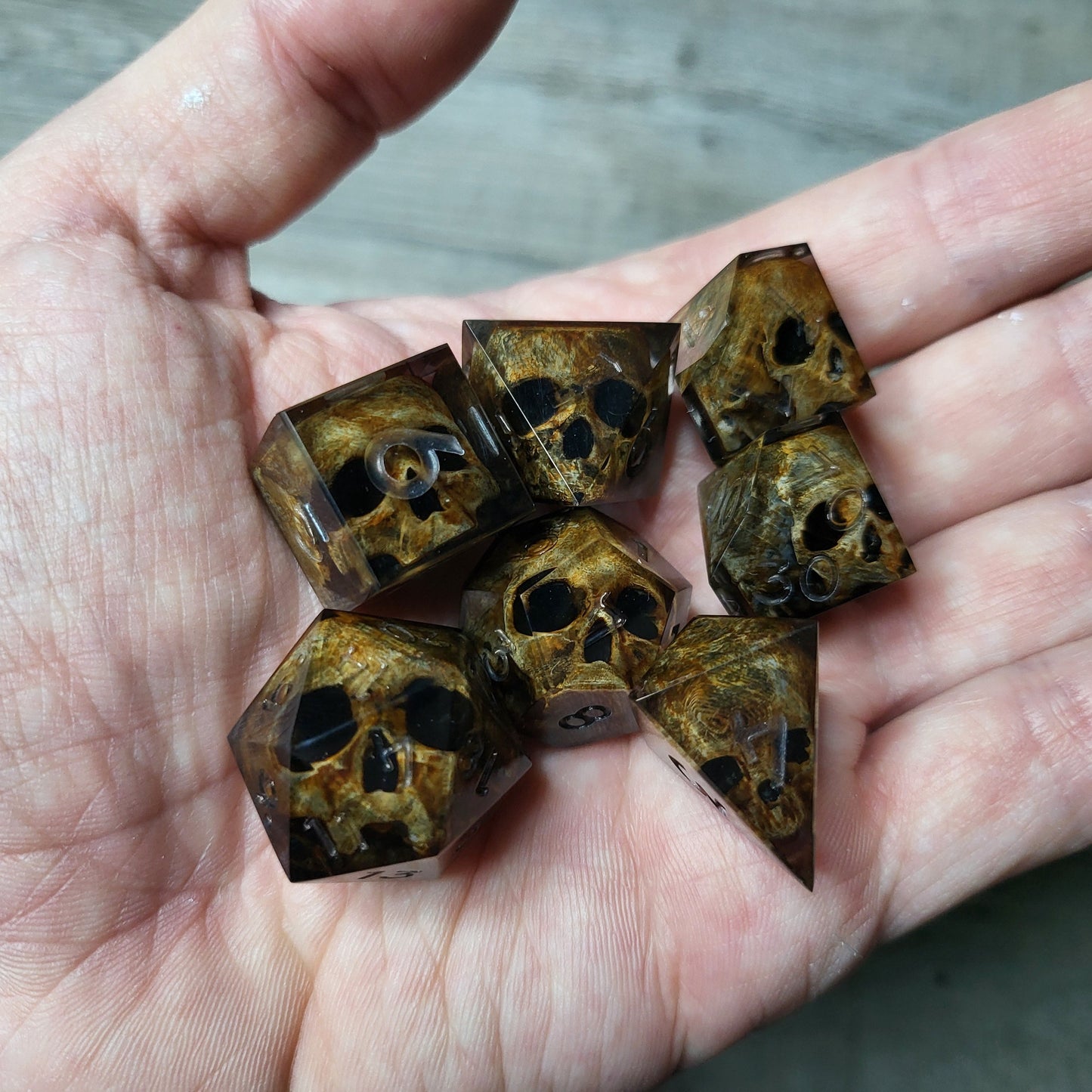 Dice set with 7 pieces with skull inside for role-playing games for Dungeons and Dragons