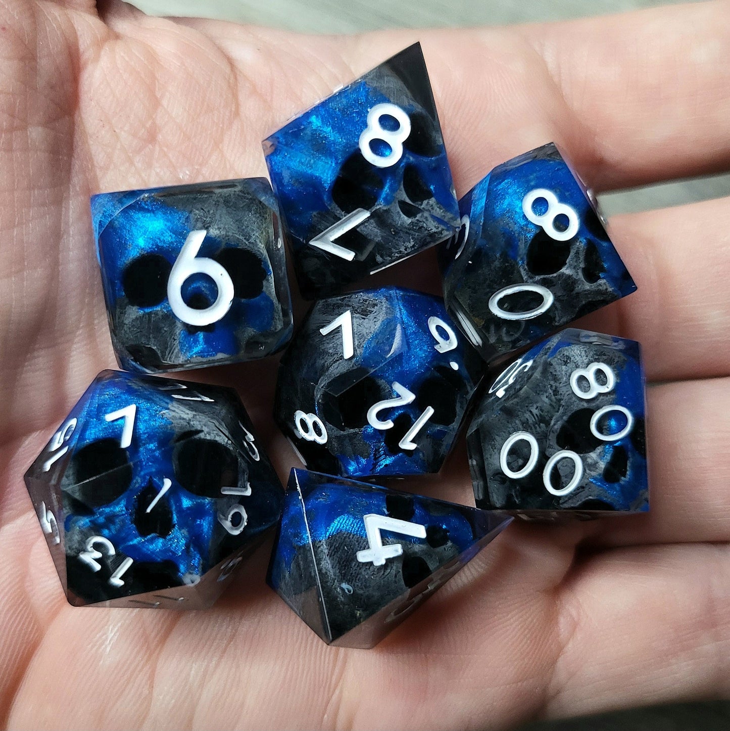 Dice set with 7 pieces with skull inside for role-playing games for Dungeons and Dragons