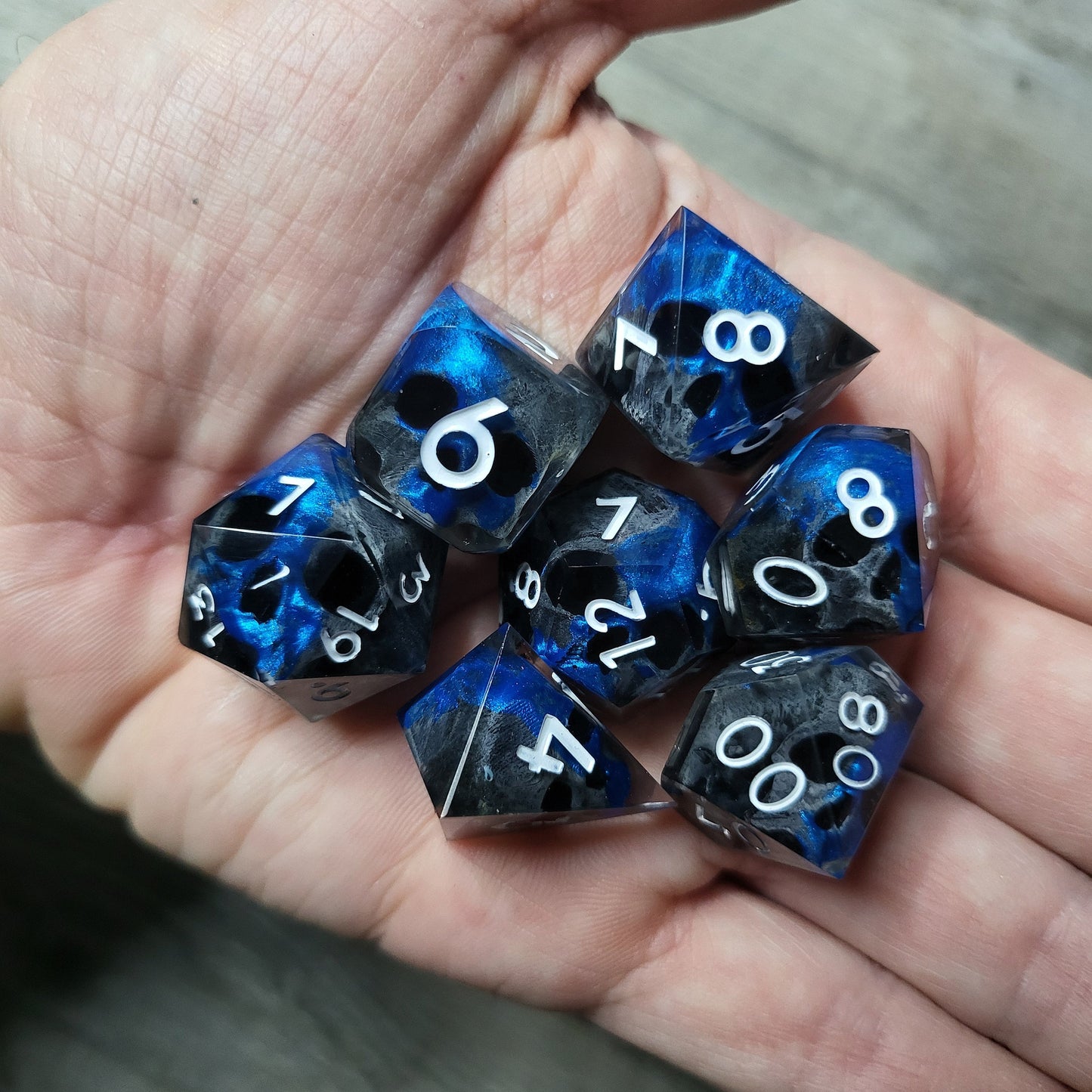 Dice set with 7 pieces with skull inside for role-playing games for Dungeons and Dragons