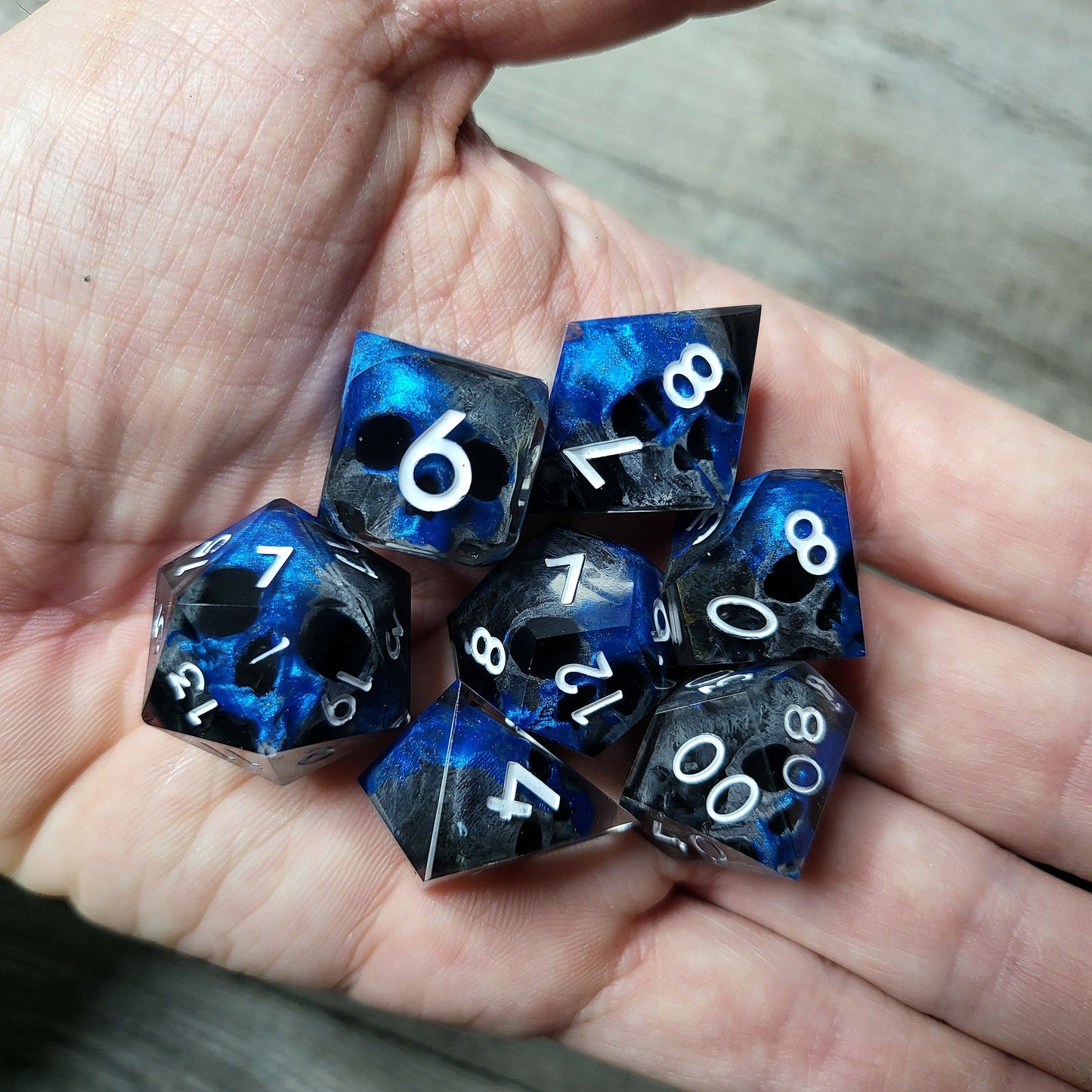 Dice set with 7 pieces with skull inside for role-playing games for Dungeons and Dragons