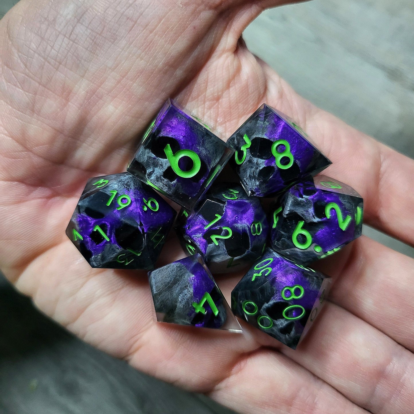 Dice set with 7 pieces with skull inside for role-playing games for Dungeons and Dragons