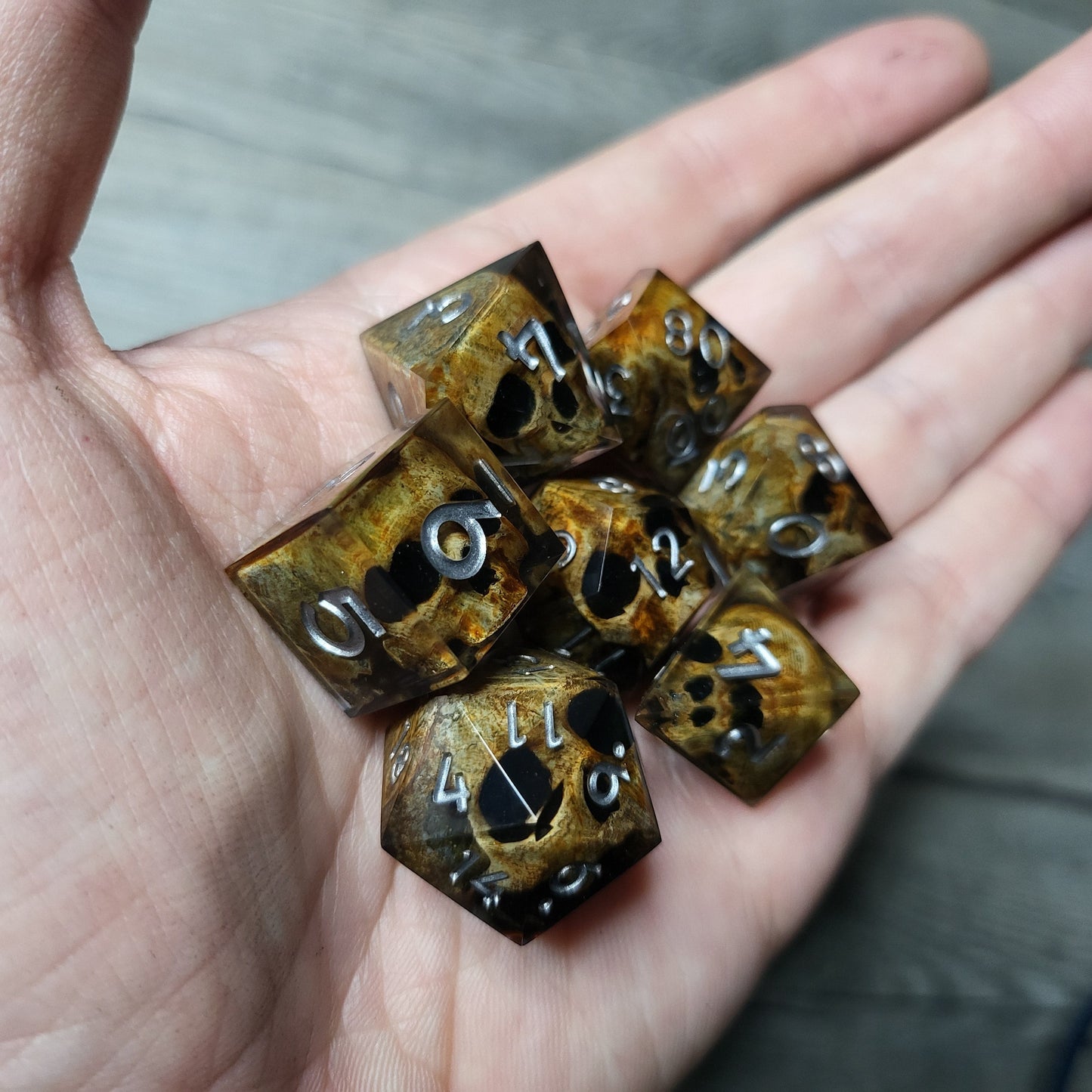 Dice set with 7 pieces with skull inside for role-playing games for Dungeons and Dragons