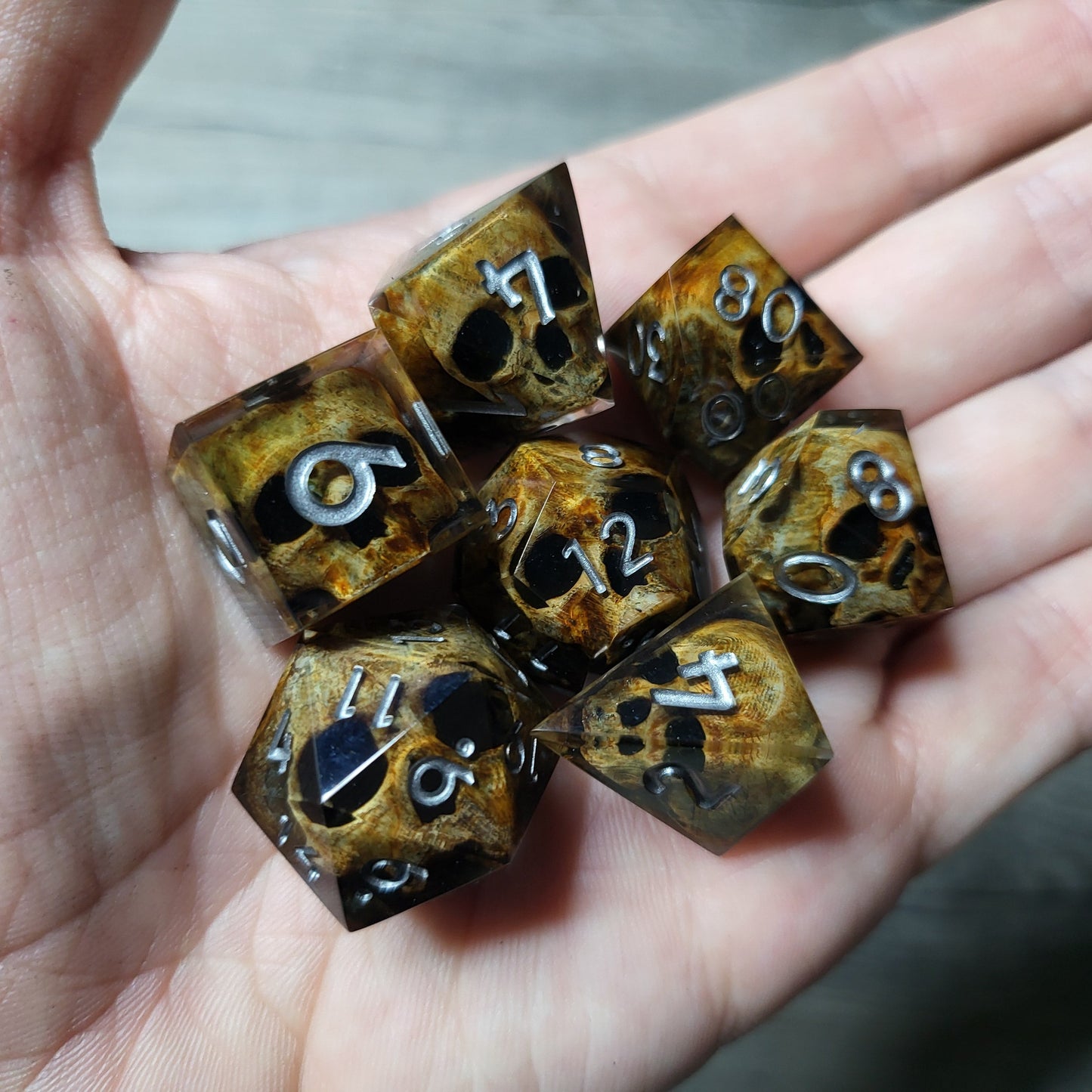 Dice set with 7 pieces with skull inside for role-playing games for Dungeons and Dragons