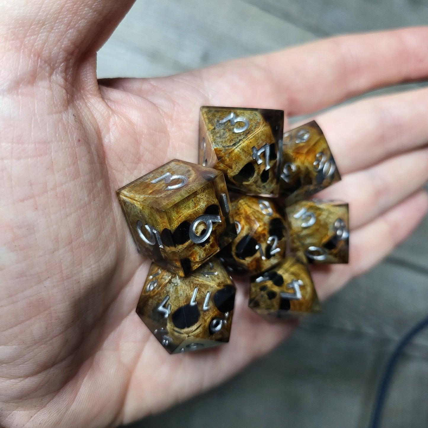 Dice set with 7 pieces with skull inside for role-playing games for Dungeons and Dragons