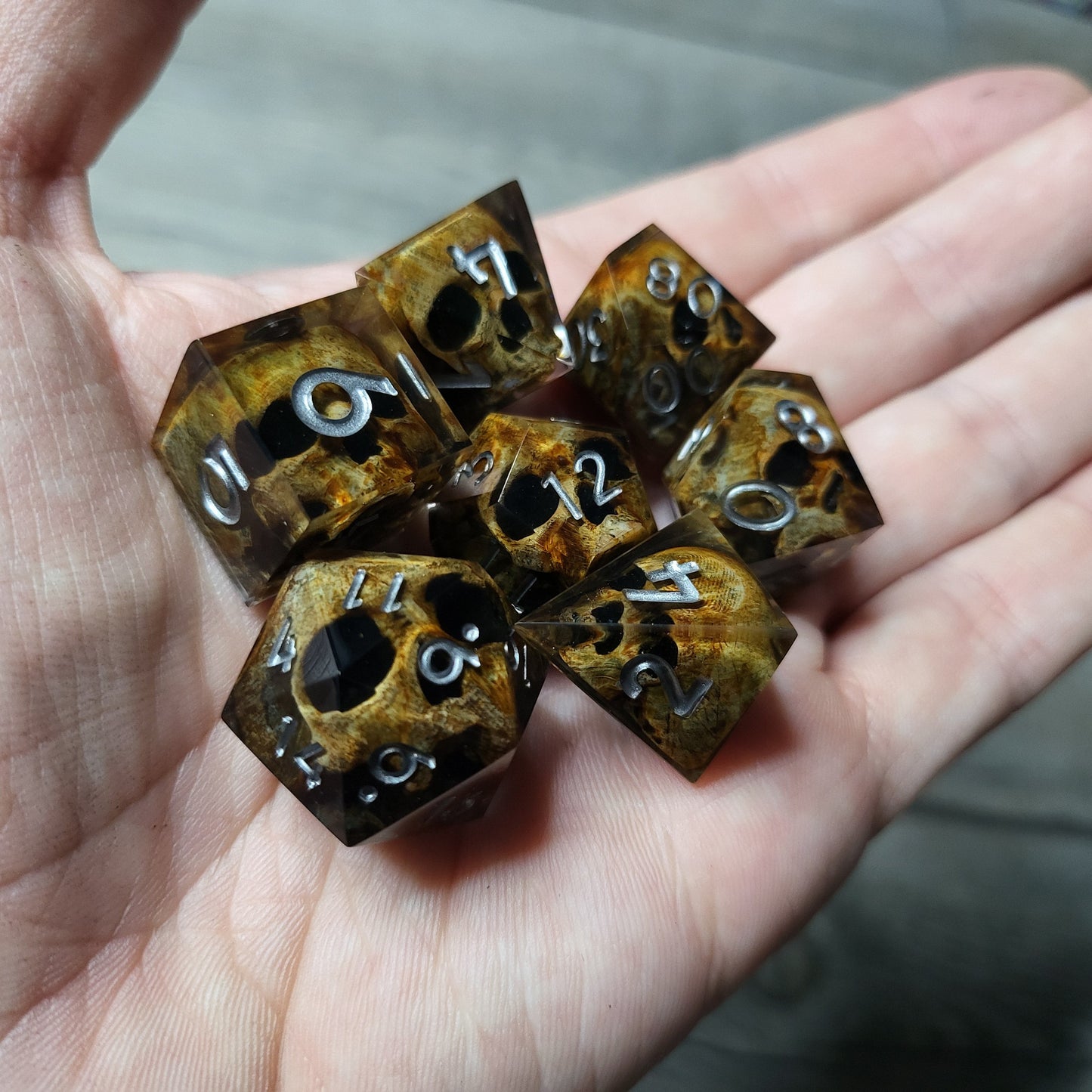 Dice set with 7 pieces with skull inside for role-playing games for Dungeons and Dragons