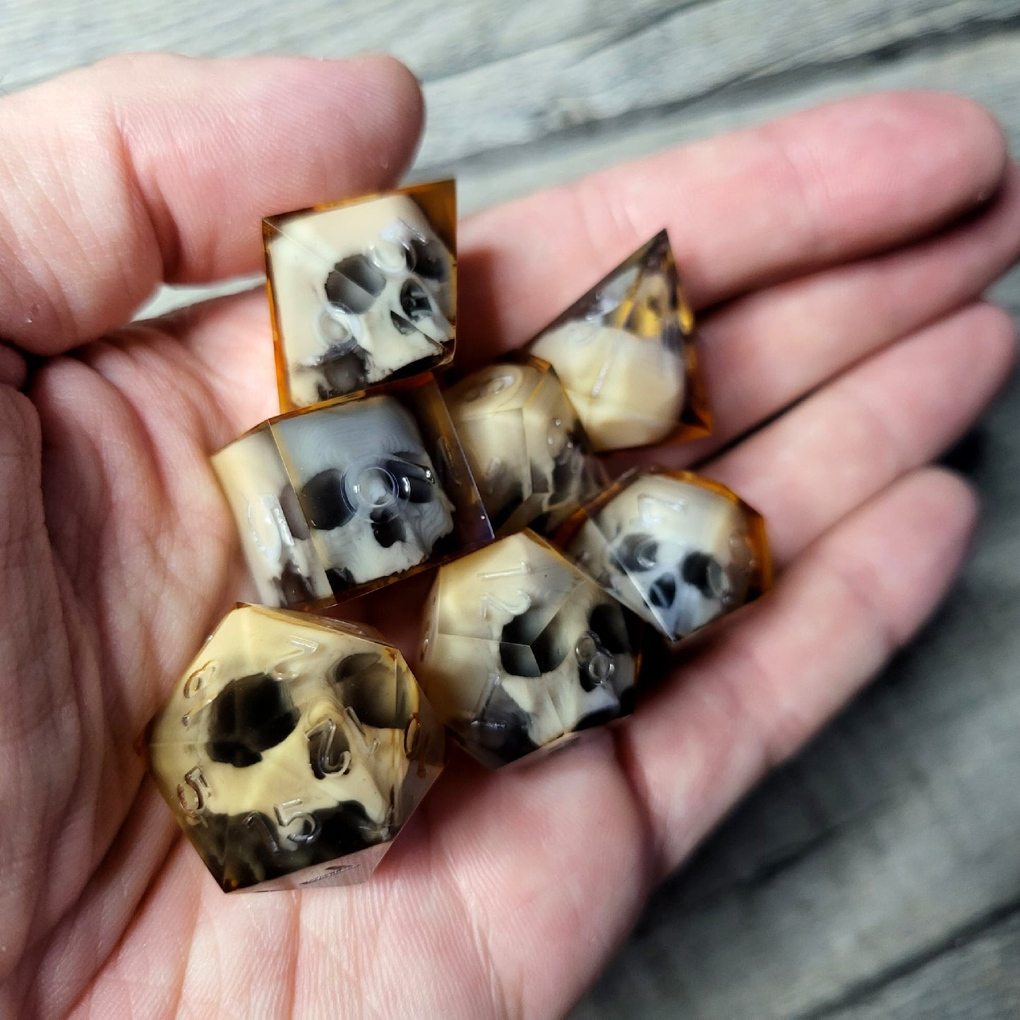 Dice set with 7 pieces with skull inside for role-playing games for Dungeons and Dragons