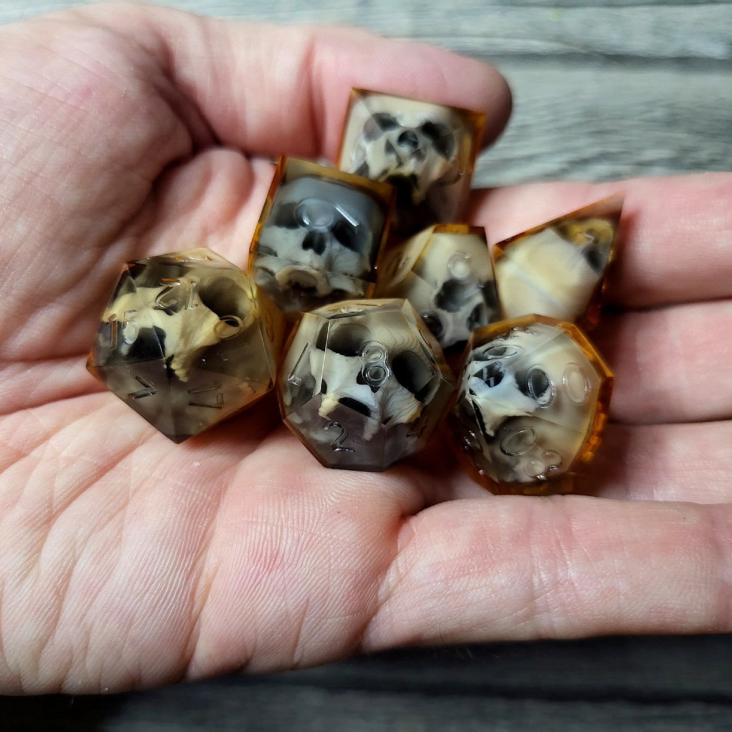 Dice set with 7 pieces with skull inside for role-playing games for Dungeons and Dragons