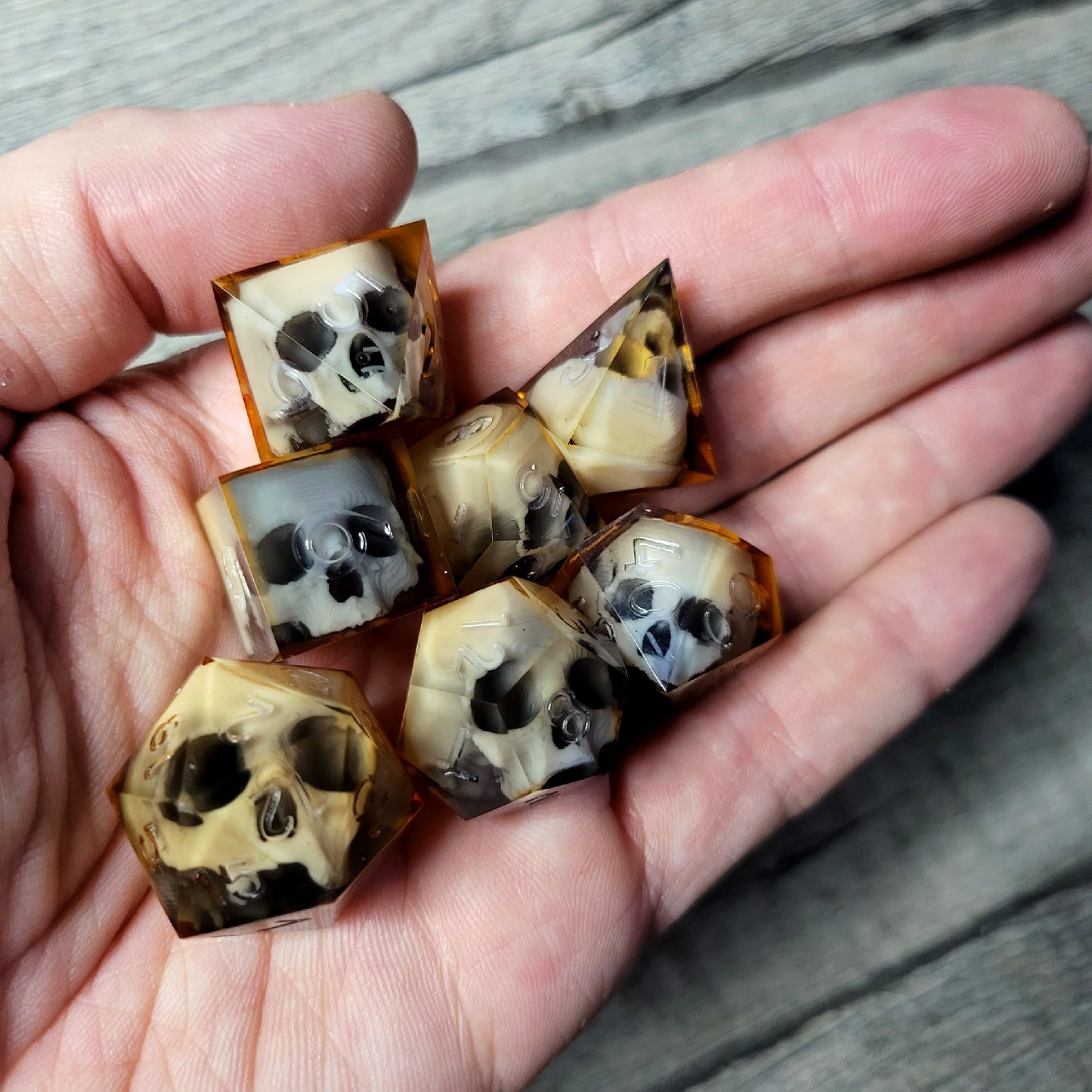 Dice set with 7 pieces with skull inside for role-playing games for Dungeons and Dragons