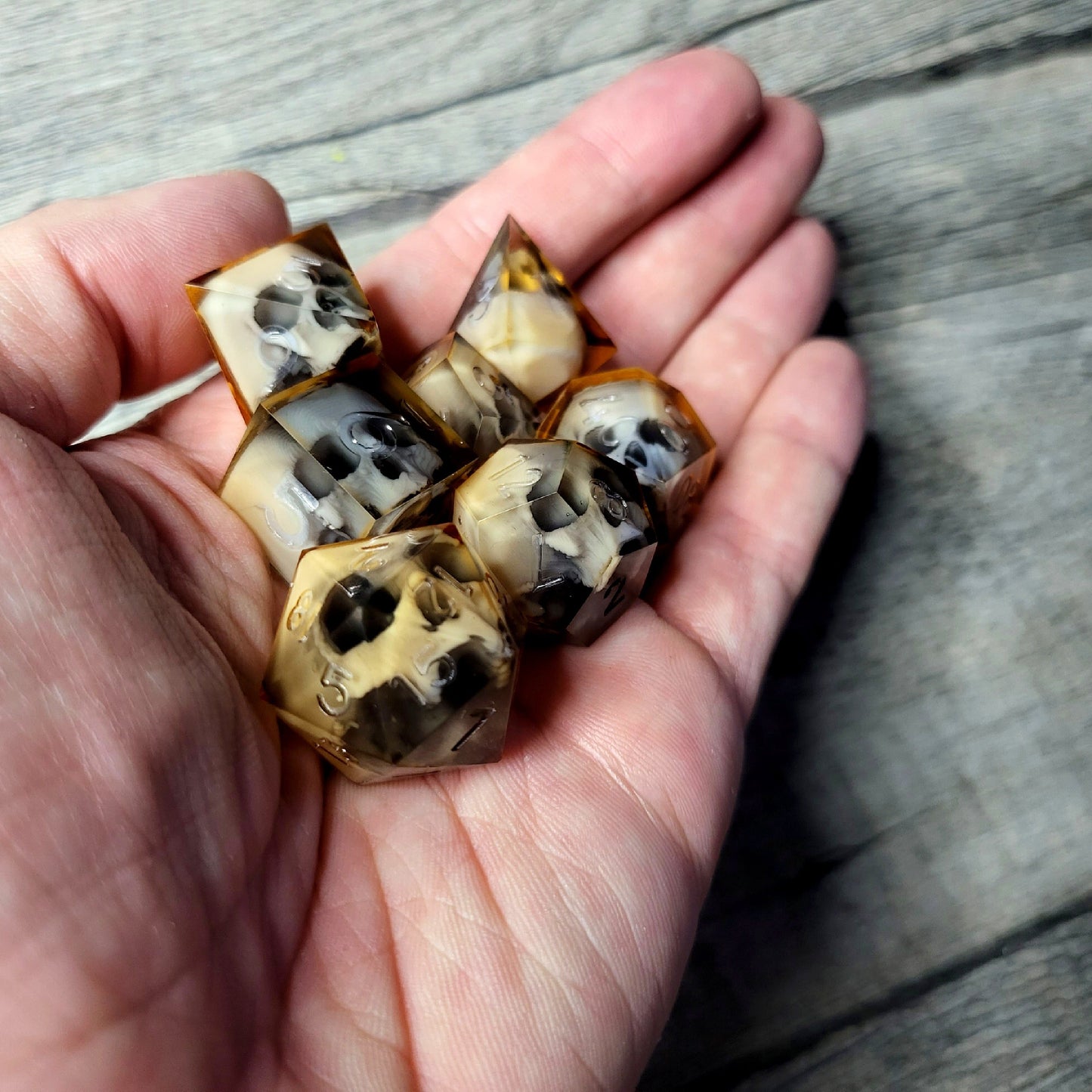 Dice set with 7 pieces with skull inside for role-playing games for Dungeons and Dragons