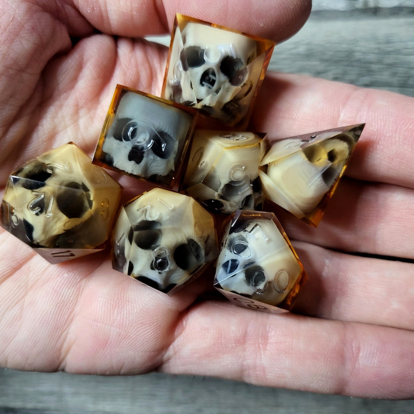 Dice set with 7 pieces with skull inside for role-playing games for Dungeons and Dragons