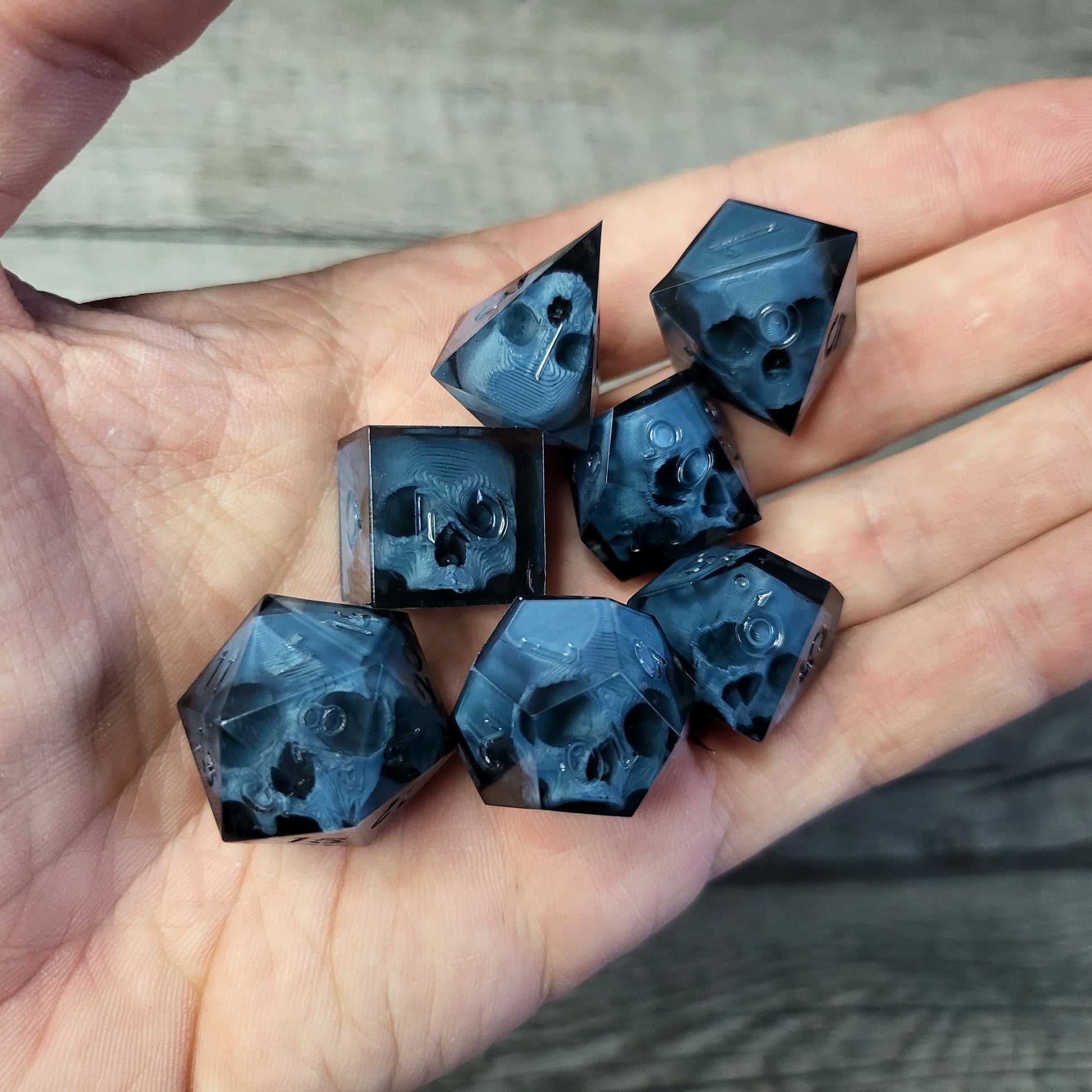 Dice set with 7 pieces with skull inside for role-playing games for Dungeons and Dragons