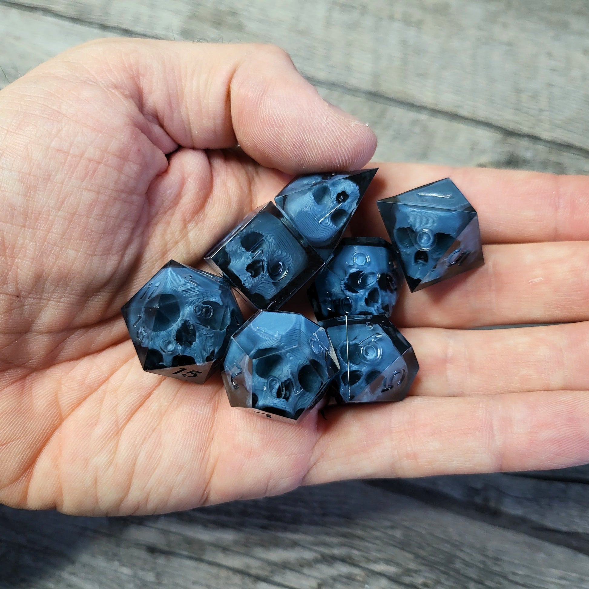 Dice set with 7 pieces with skull inside for role-playing games for Dungeons and Dragons
