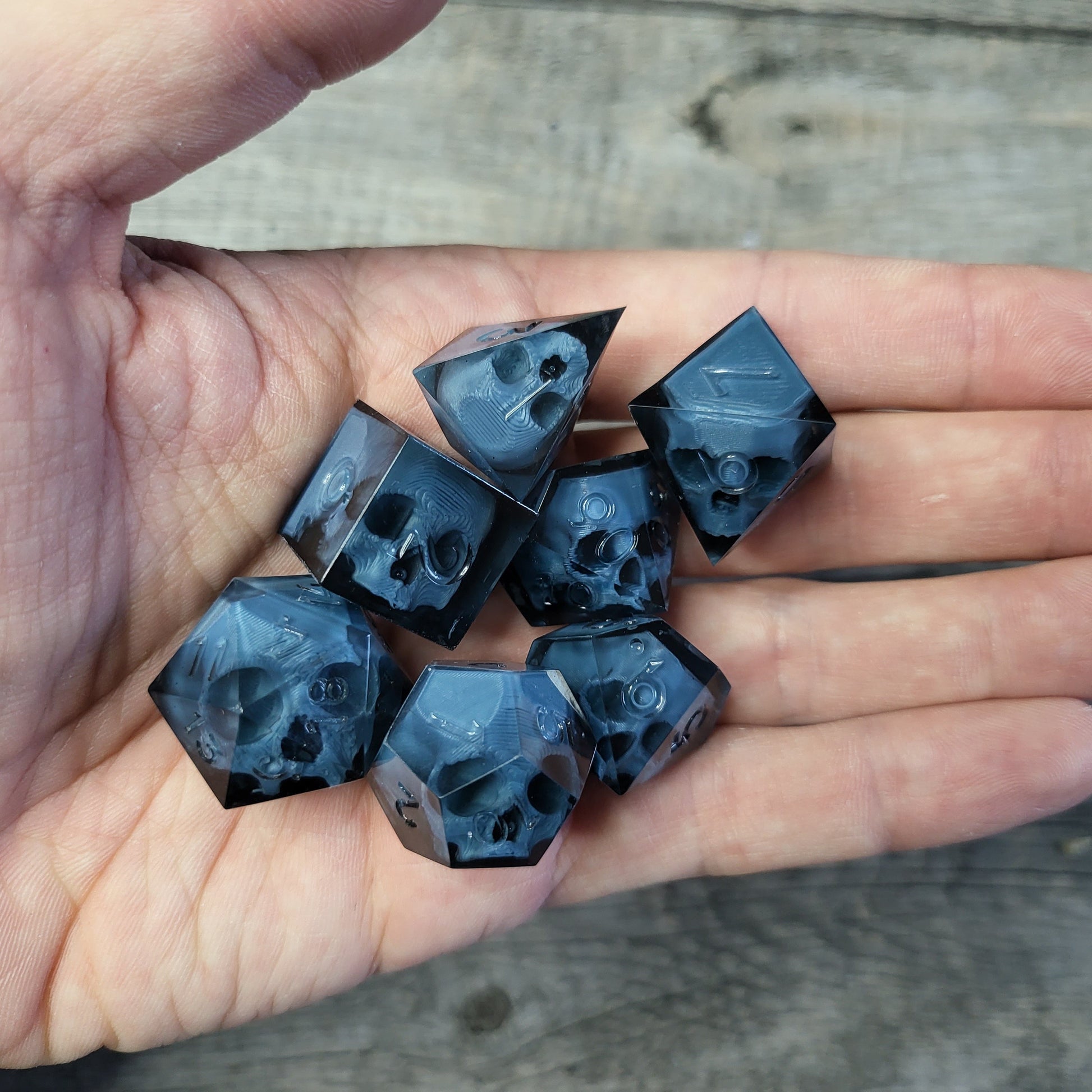 Dice set with 7 pieces with skull inside for role-playing games for Dungeons and Dragons