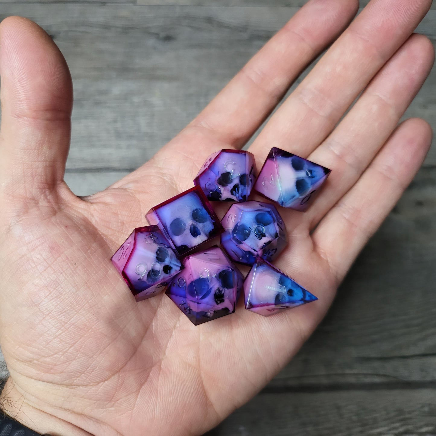 Dice set with 7 pieces with skull inside for role-playing games for Dungeons and Dragons