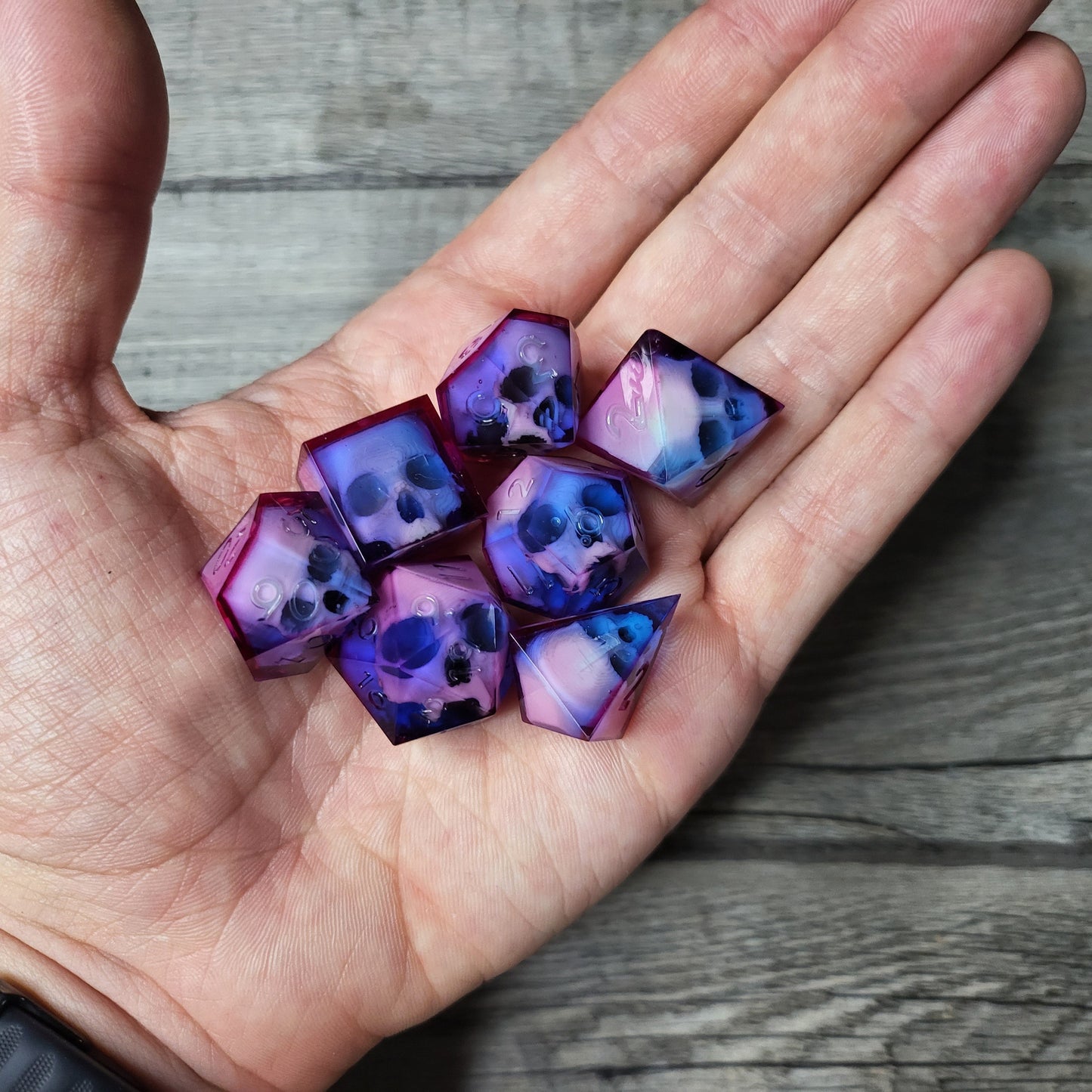 Dice set with 7 pieces with skull inside for role-playing games for Dungeons and Dragons