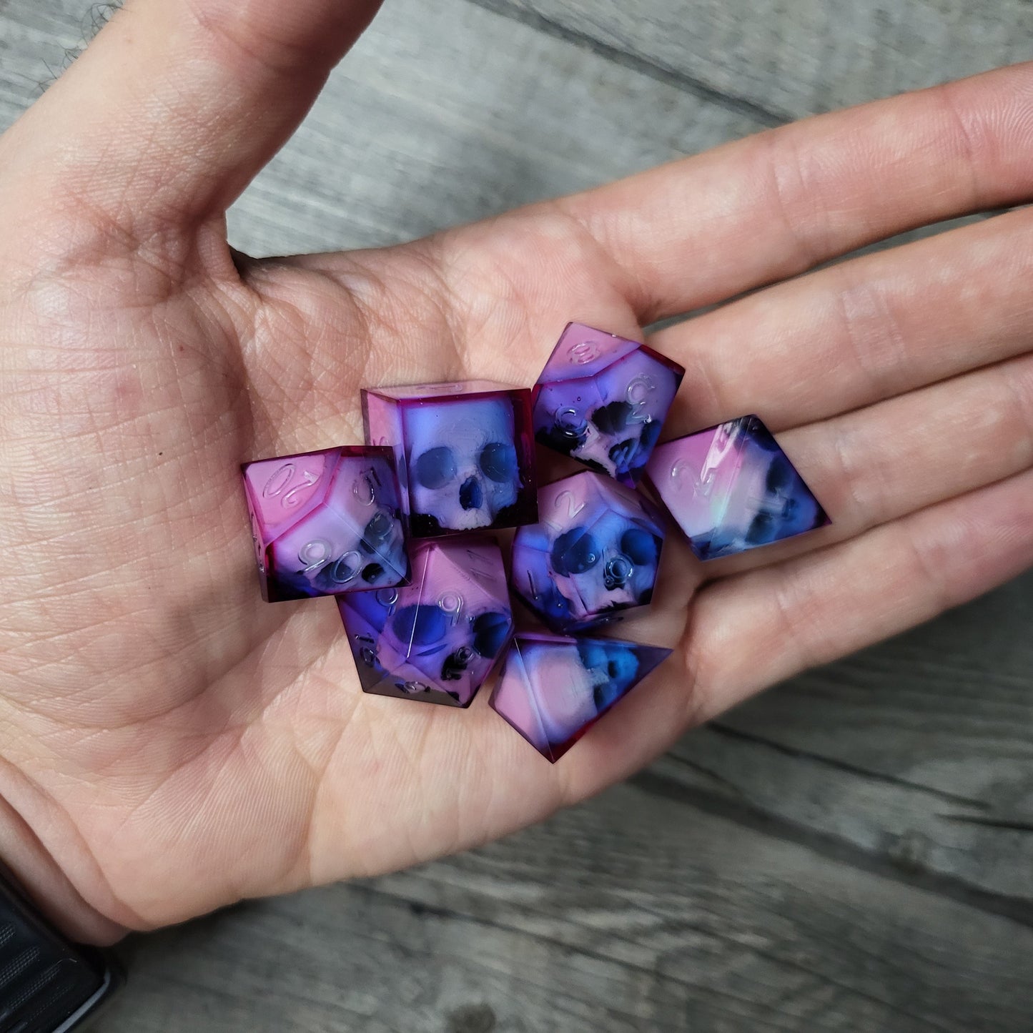 Dice set with 7 pieces with skull inside for role-playing games for Dungeons and Dragons